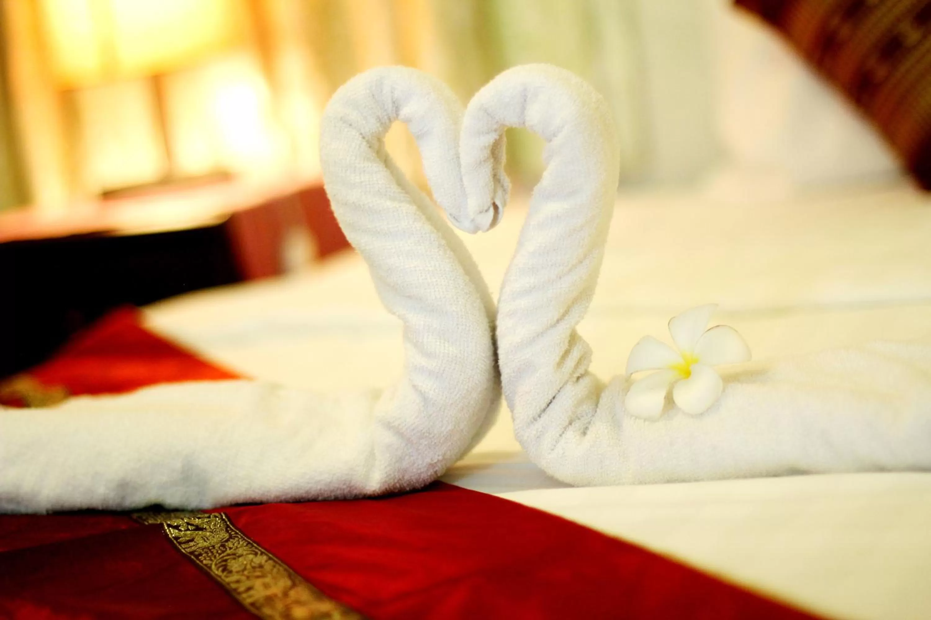 Bed in New Season Riverside Hotel