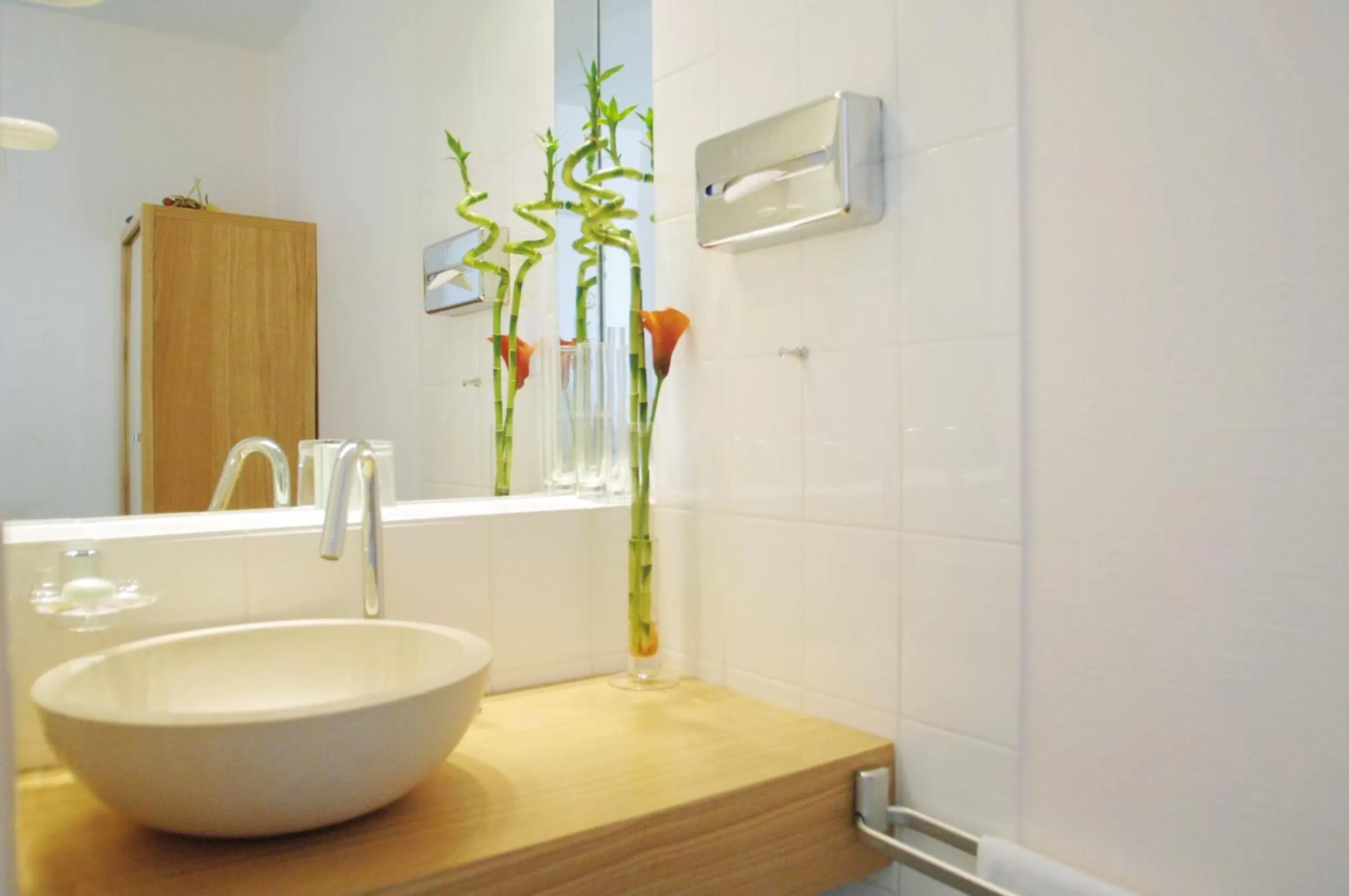 Bathroom in ambassador hotel & spa
