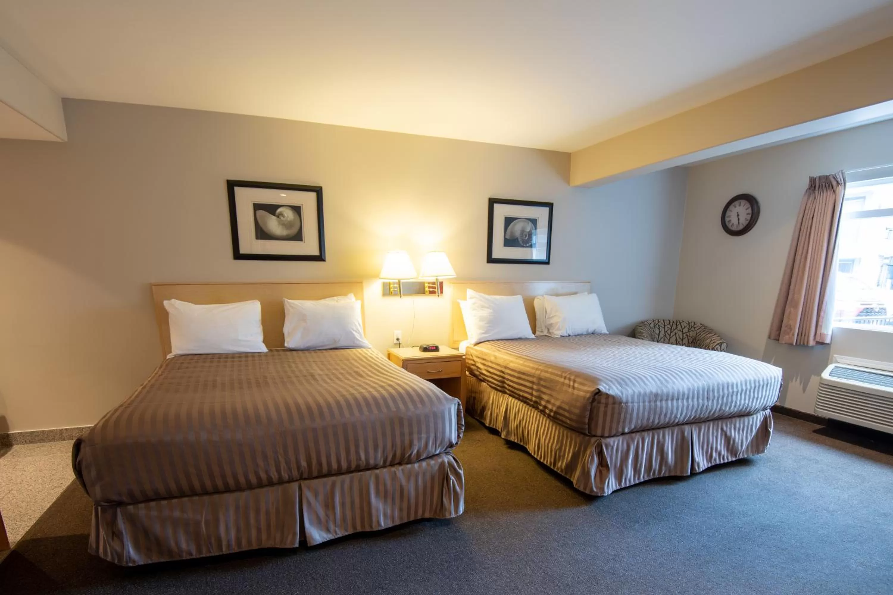 Bed in Canadas Best Value Inn-Prince George