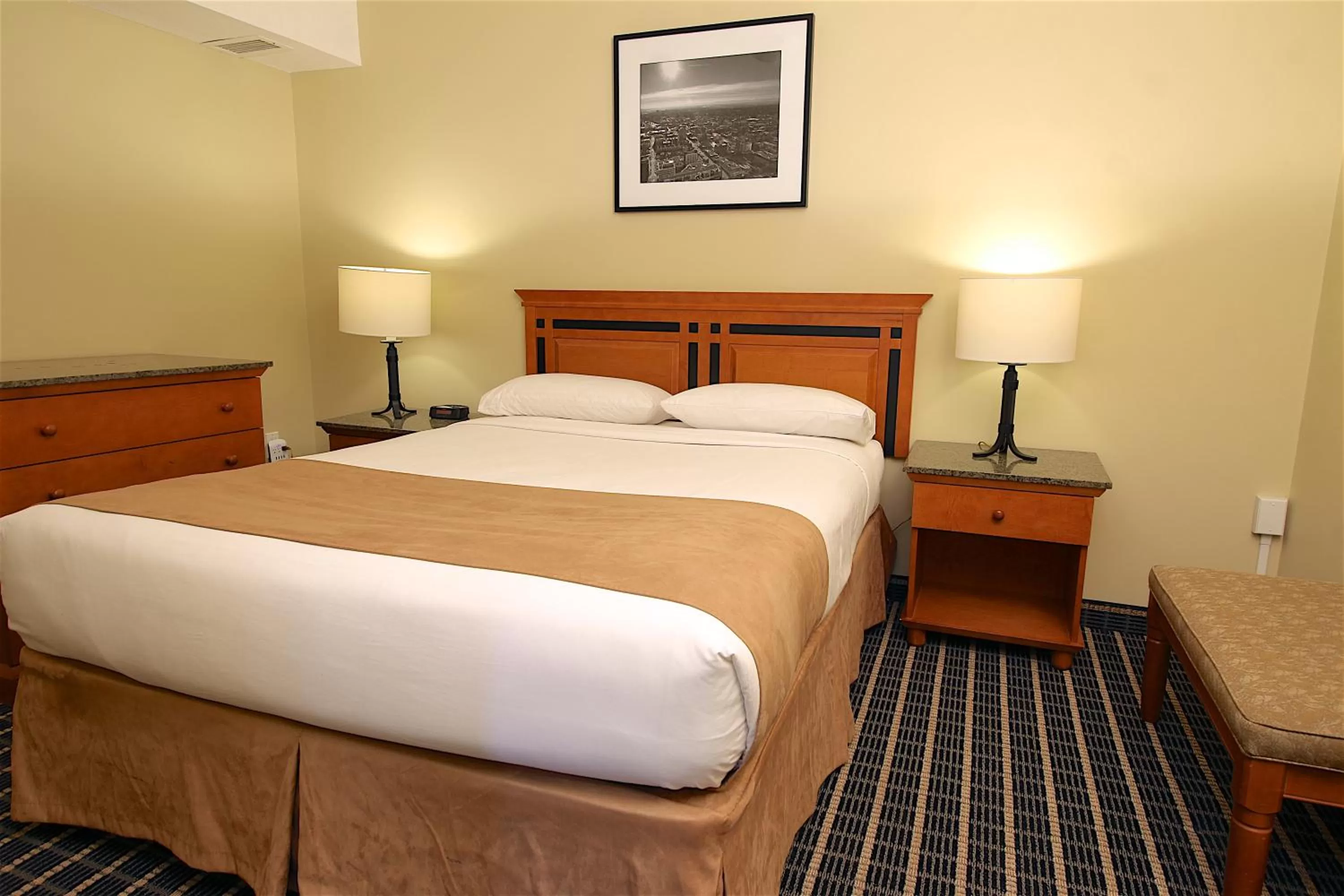 Bed in Medicine Hat Suites