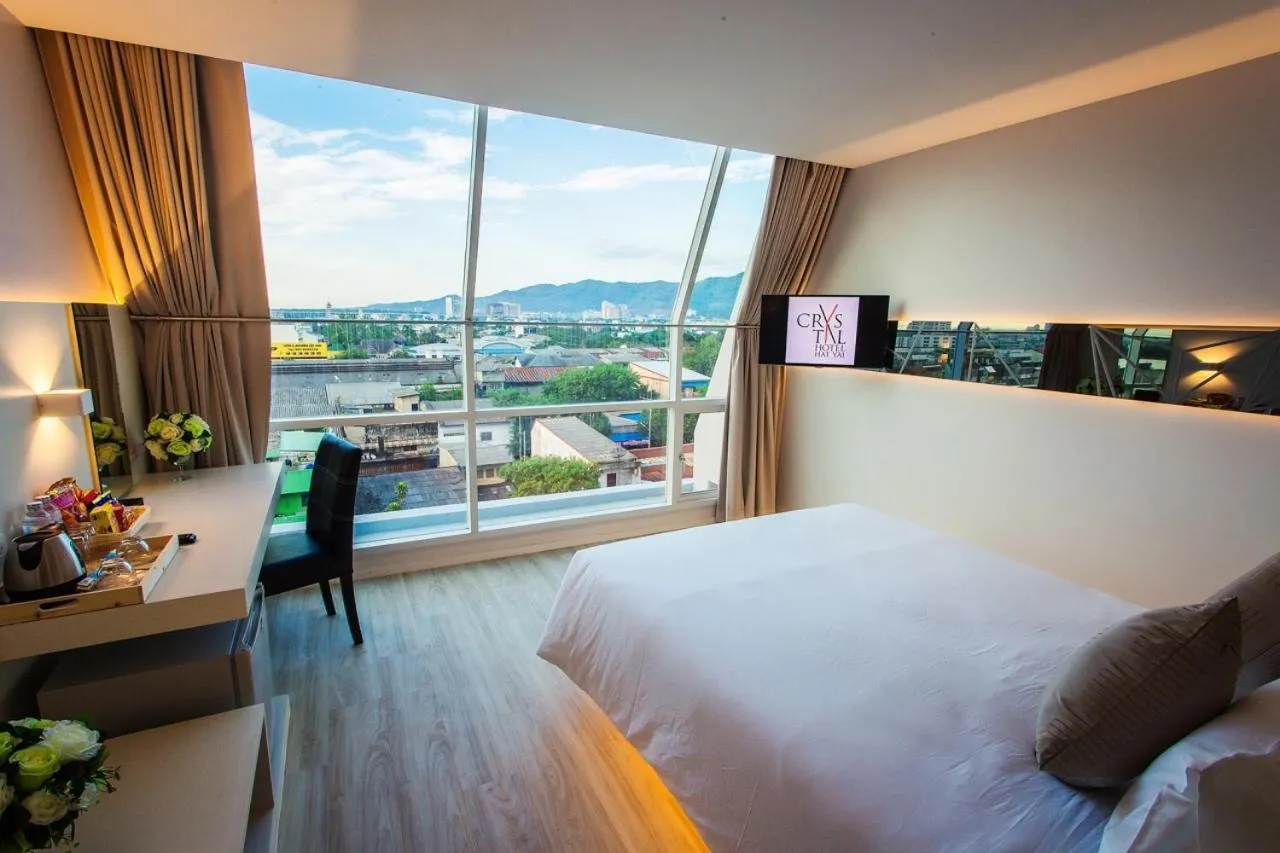 Photo of the whole room, Bed in Crystal Hotel Hat Yai