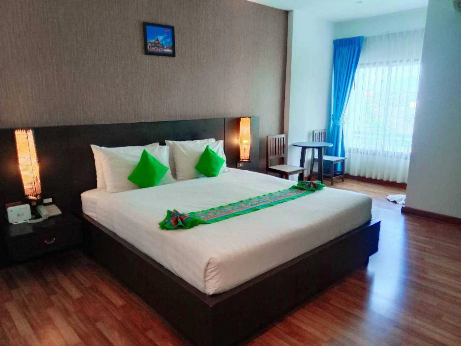 Bed in Jingjit Hotel
