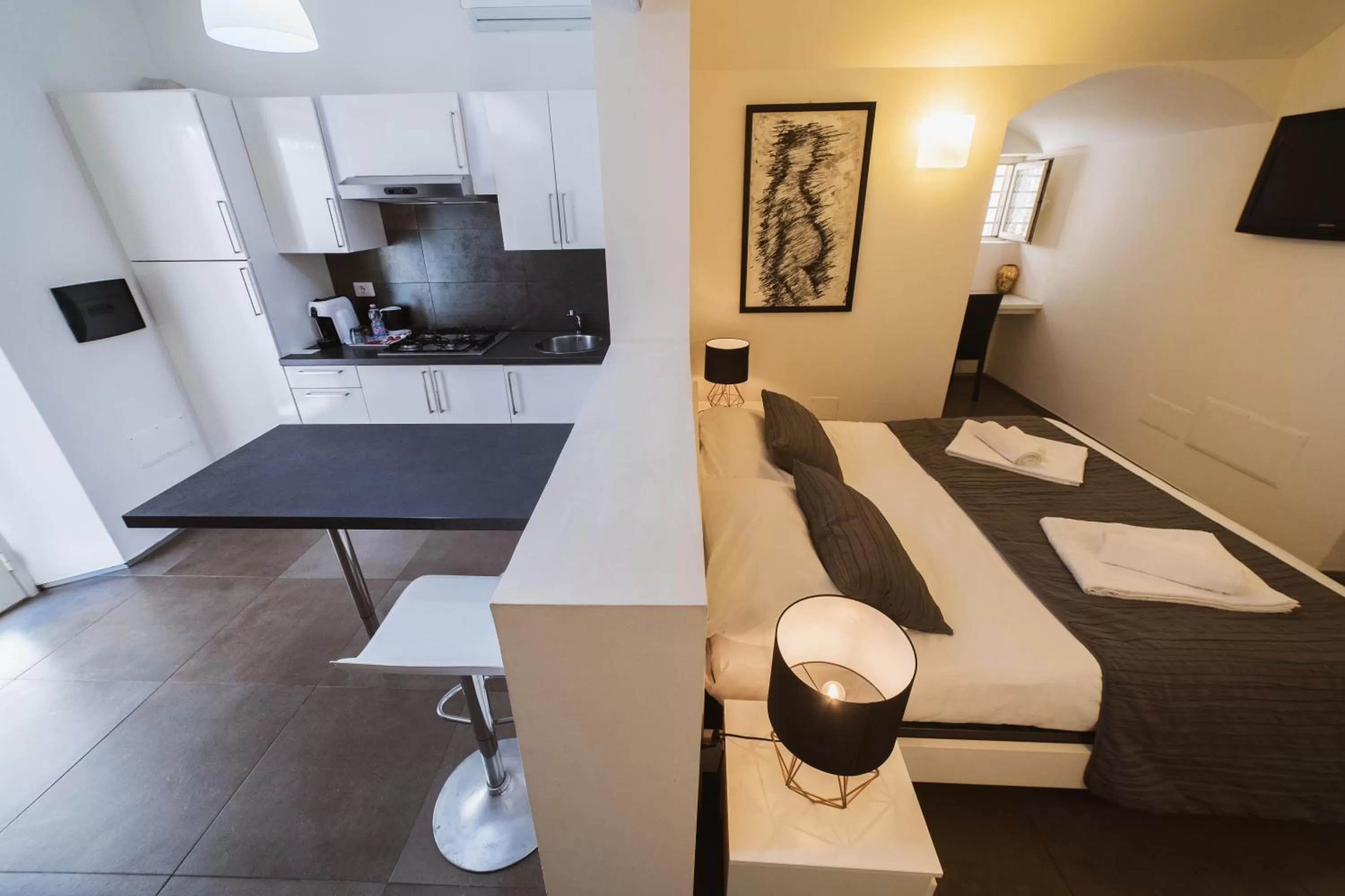 Photo of the whole room in Villino Erminia - Seaside Art b&b