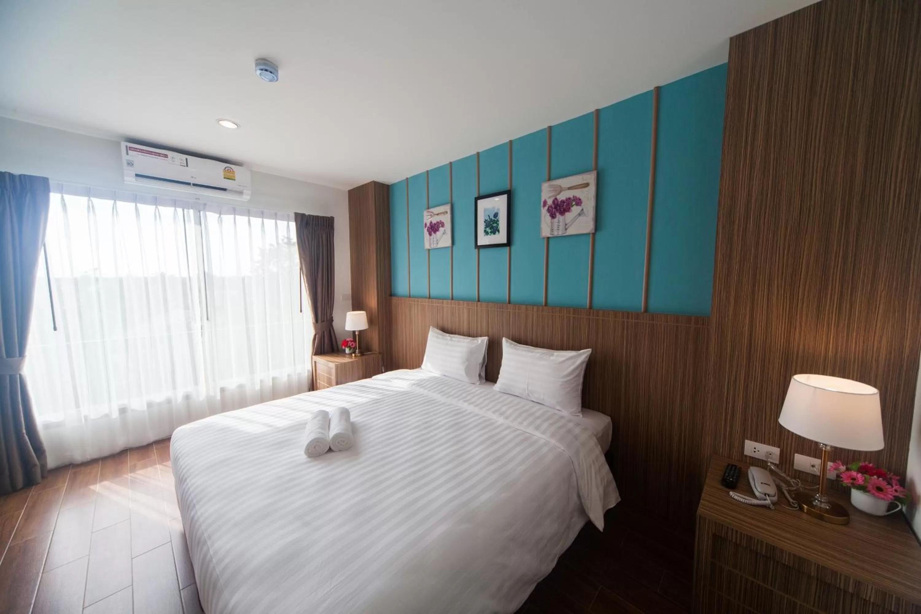 Bedroom, Bed in Anchan Laguna Hotel โรงแรมอัญชันลากูน่า