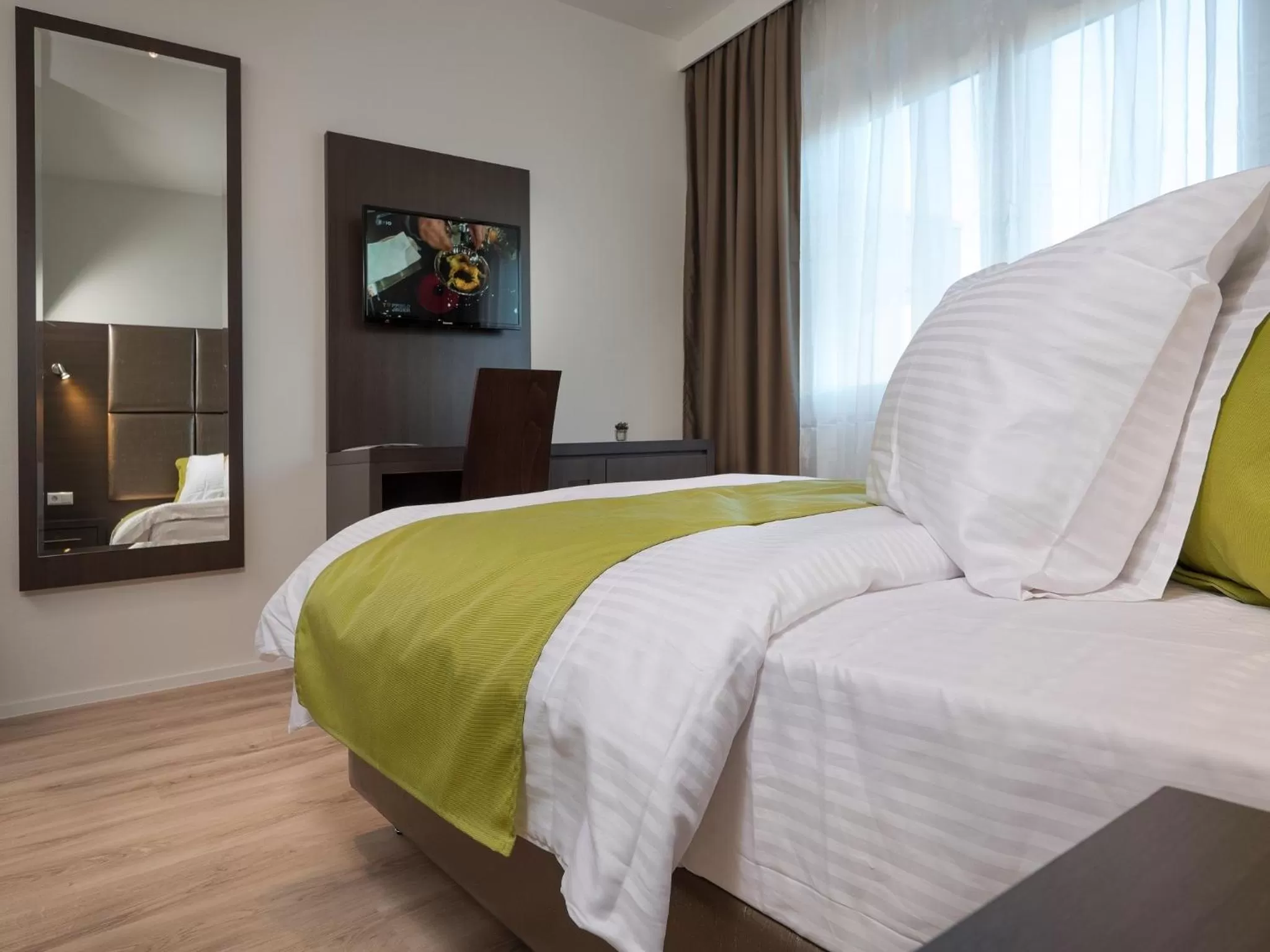 Bed in Boutique Hotel Bellevue Rheinfelden / Basel