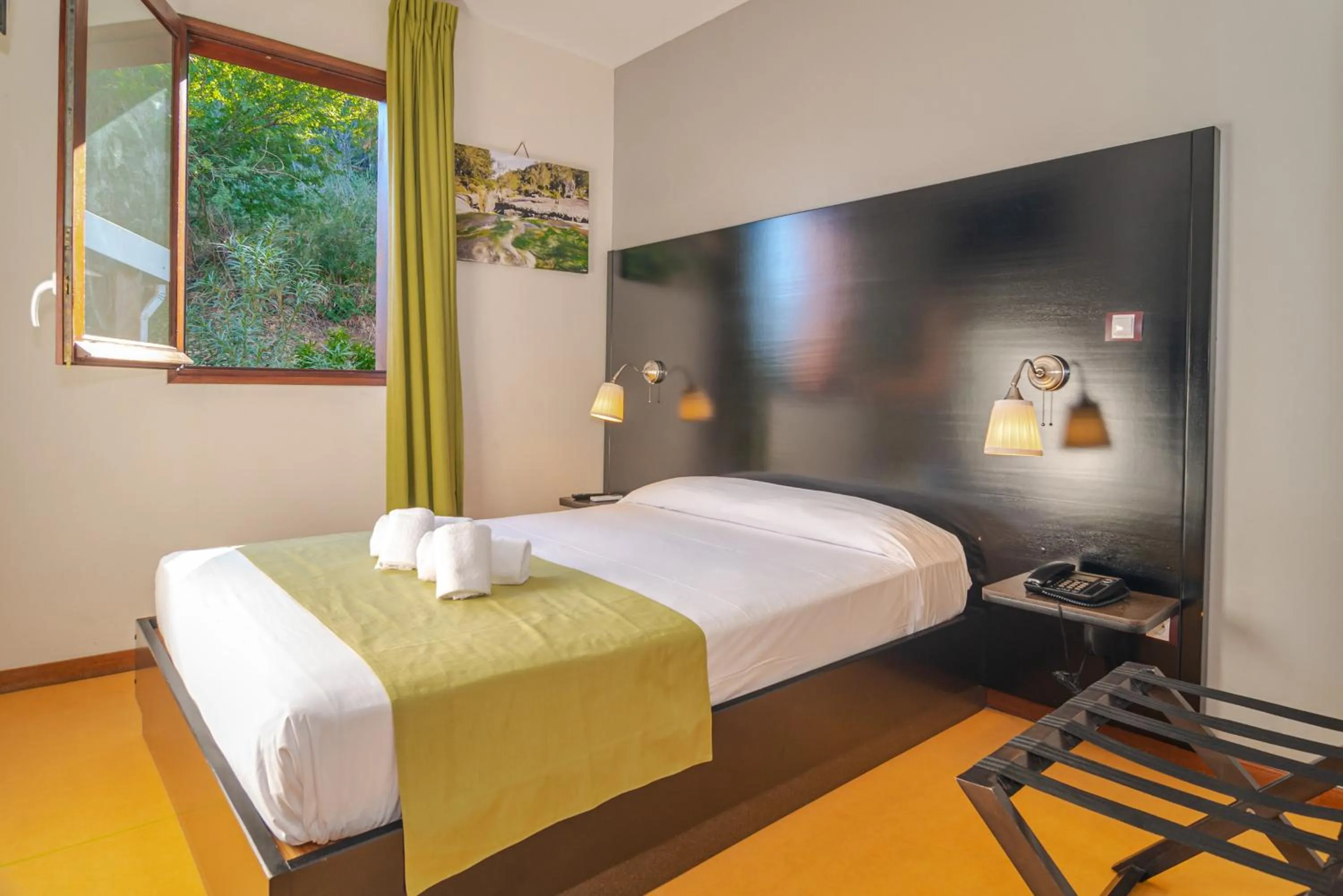 Photo of the whole room, Bed in Tama Hotel