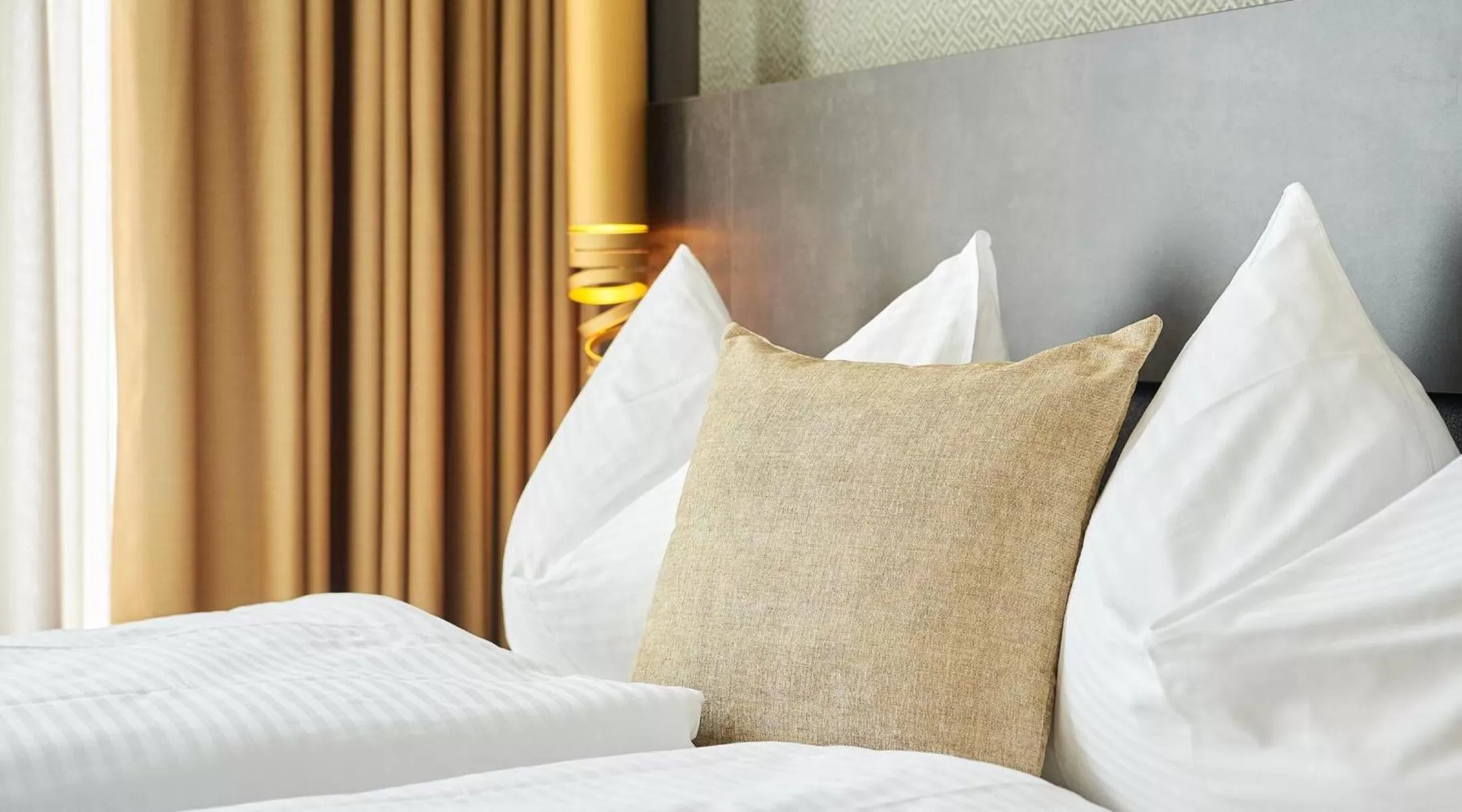 Bed in Lumen Apartments