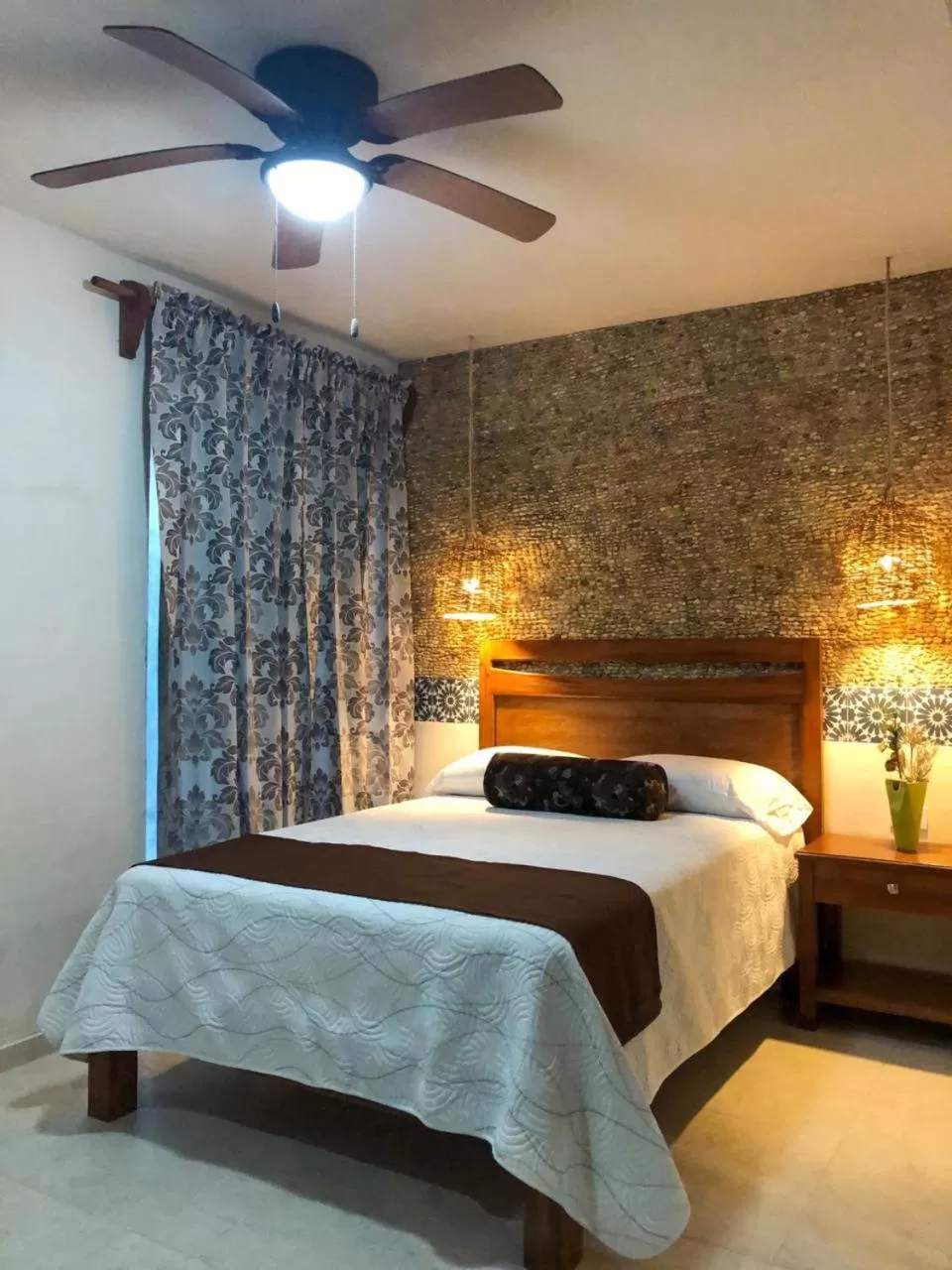 Bed in Hotel Boutique Bugambilias