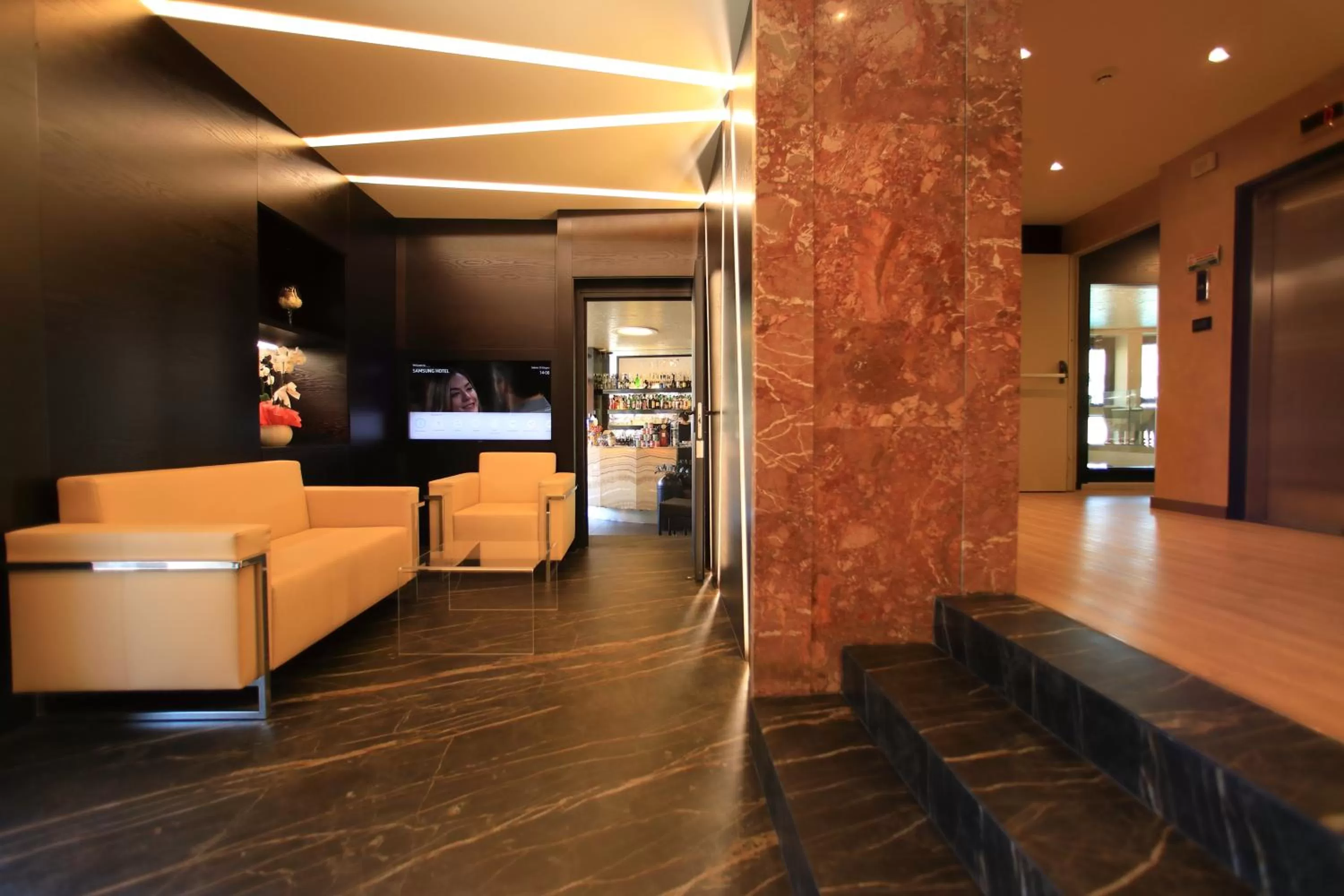 Lobby or reception in Hotel Bell'arrivo by Dori