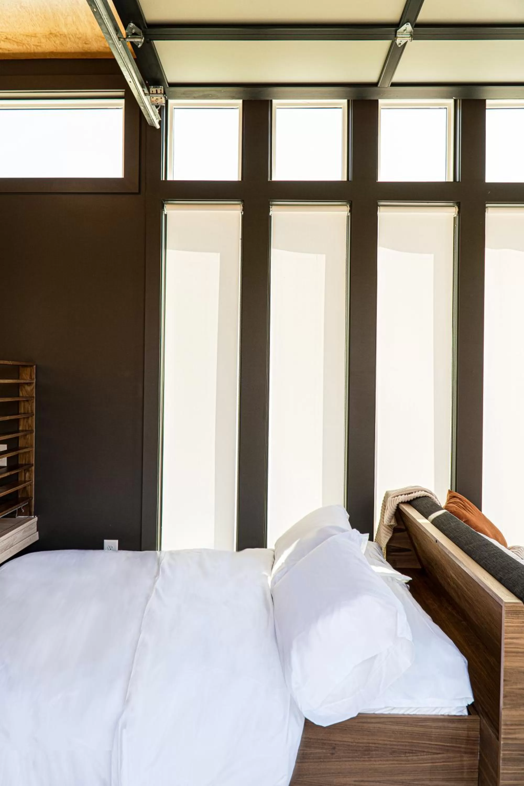 Bed in Ironwood Grove, Tiny House Hotel