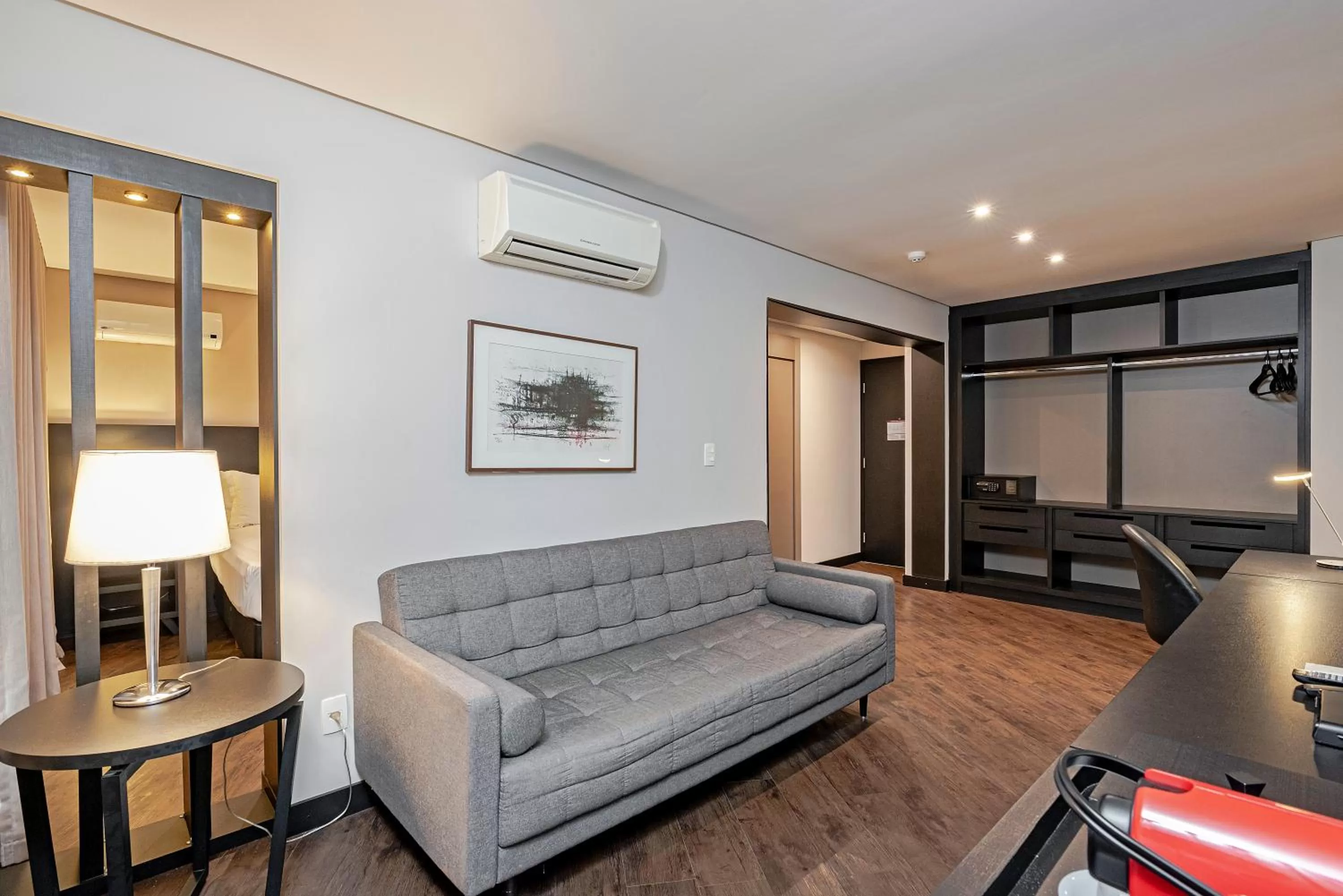 Living room, Bed in Slaviero Baia Norte Florianópolis