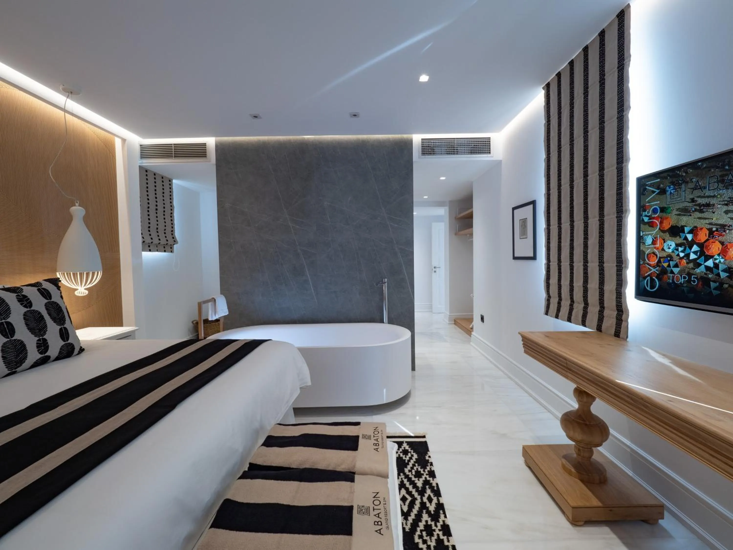 Bed in Abaton Island Resort & Spa