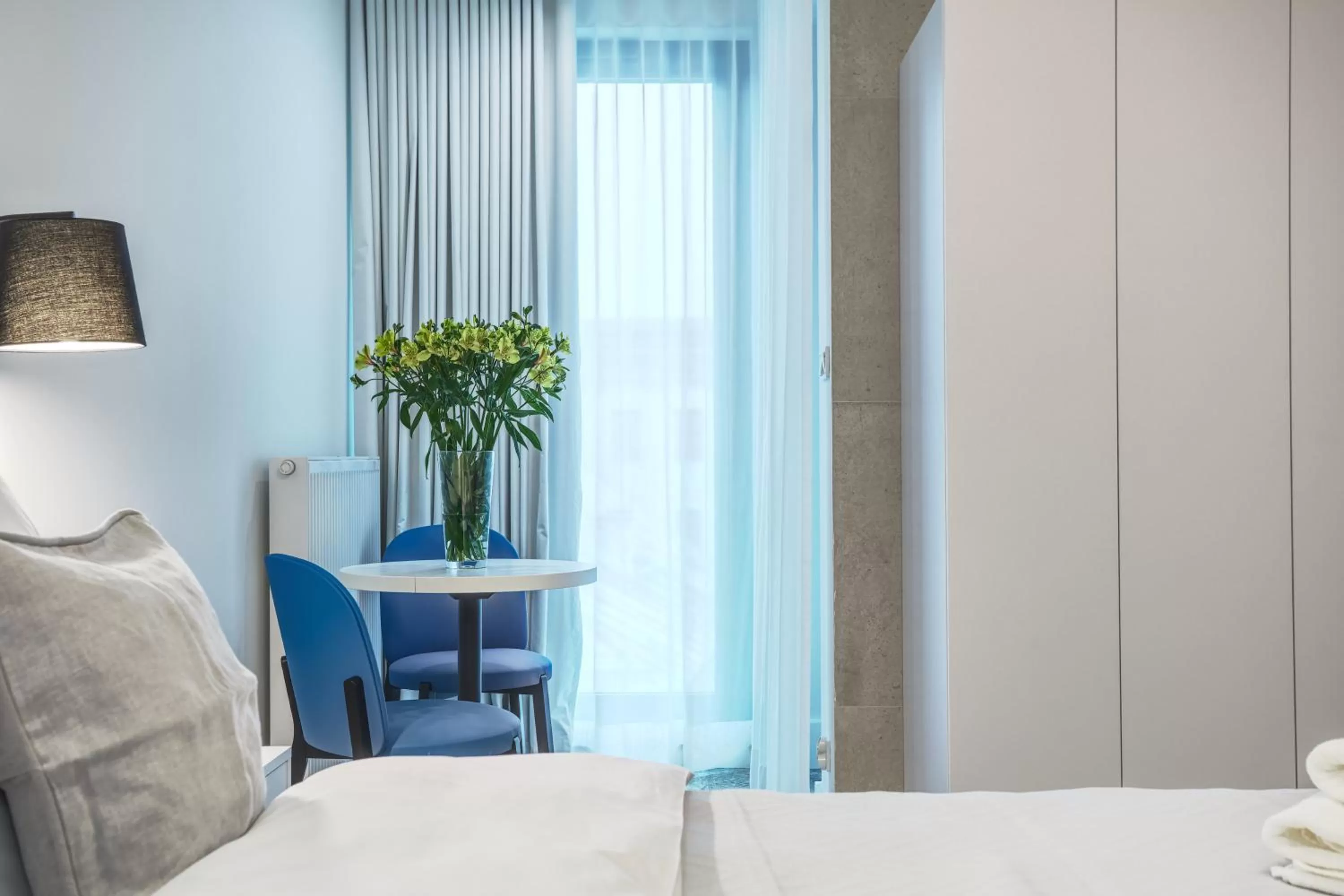 Seating area, Bed in RAJSKA 3 by PI Apartments