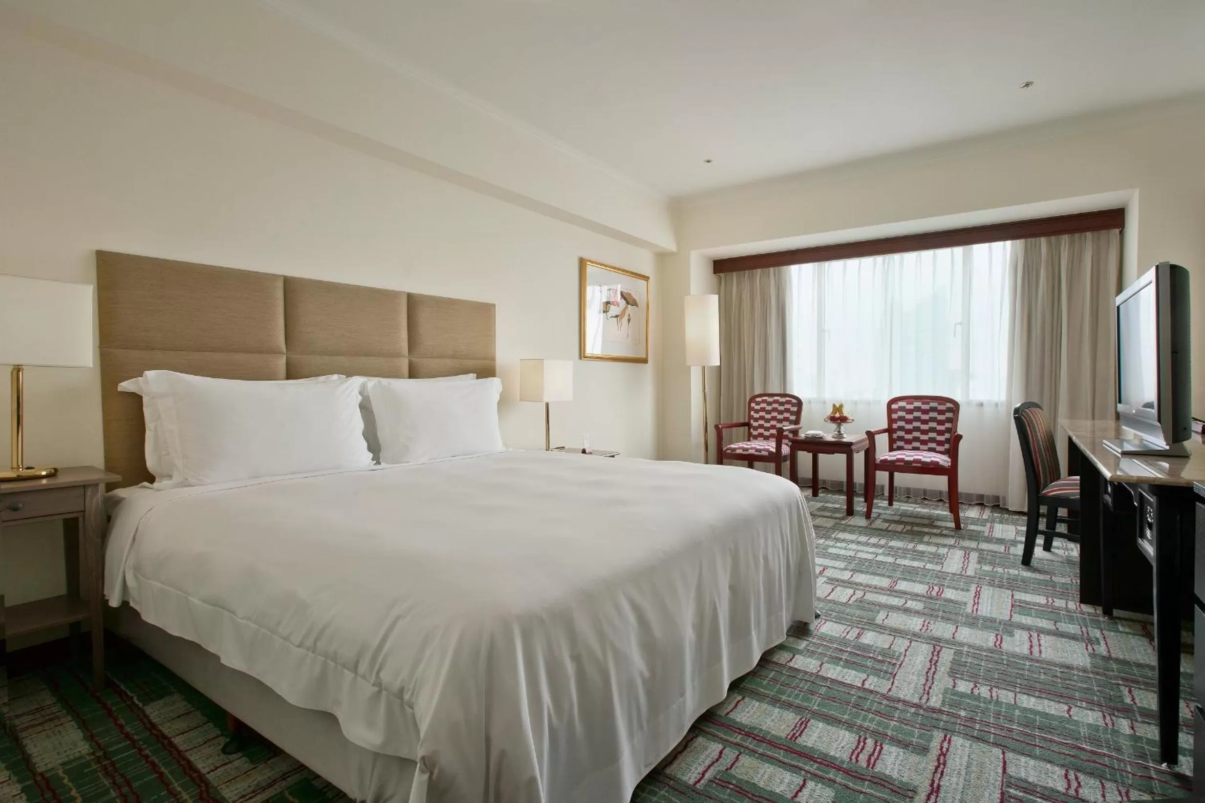 Bed in The Howard Plaza Hotel Kaohsiung