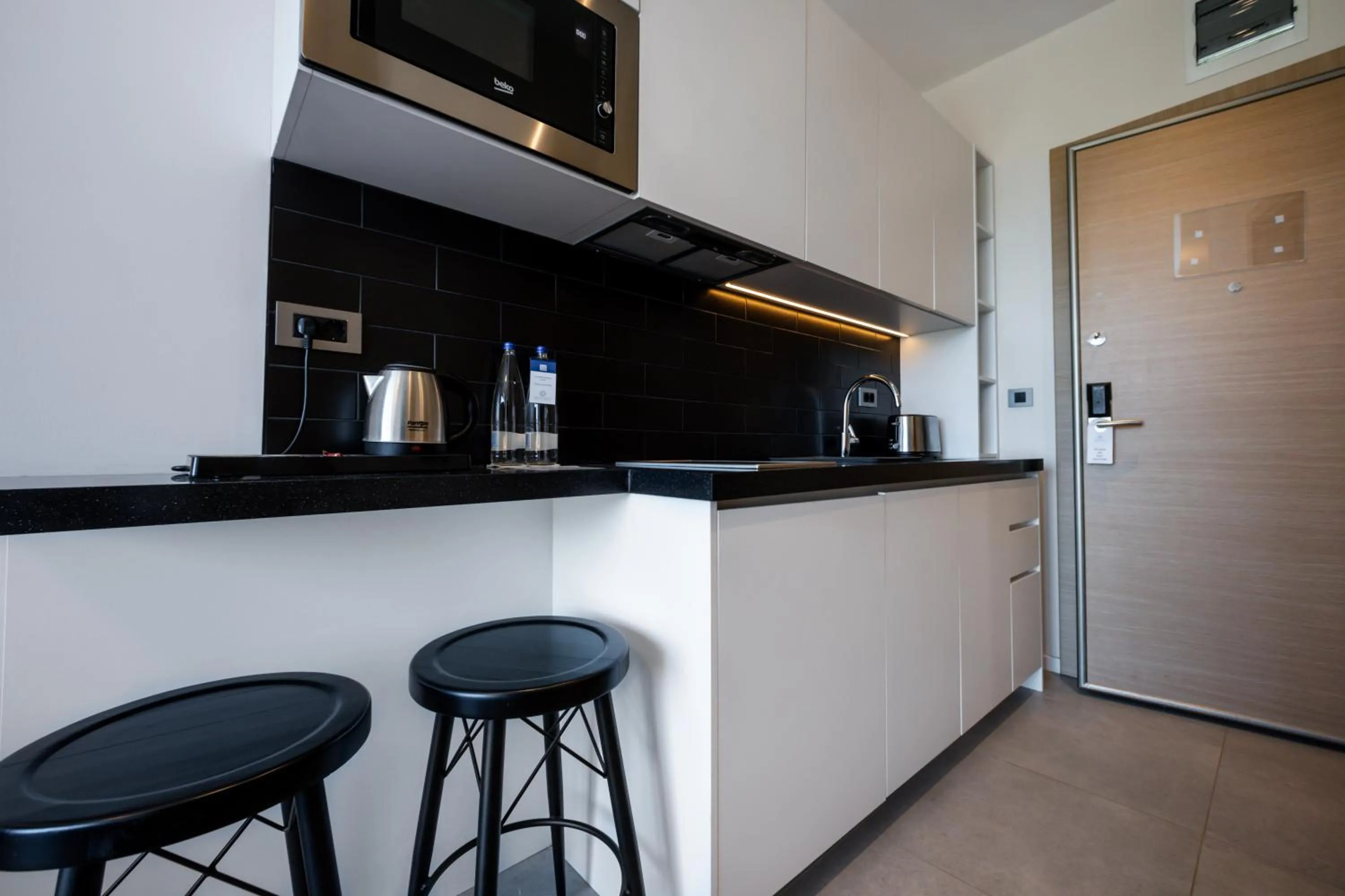 Kitchen or kitchenette in Royal Blue Resort & Residences