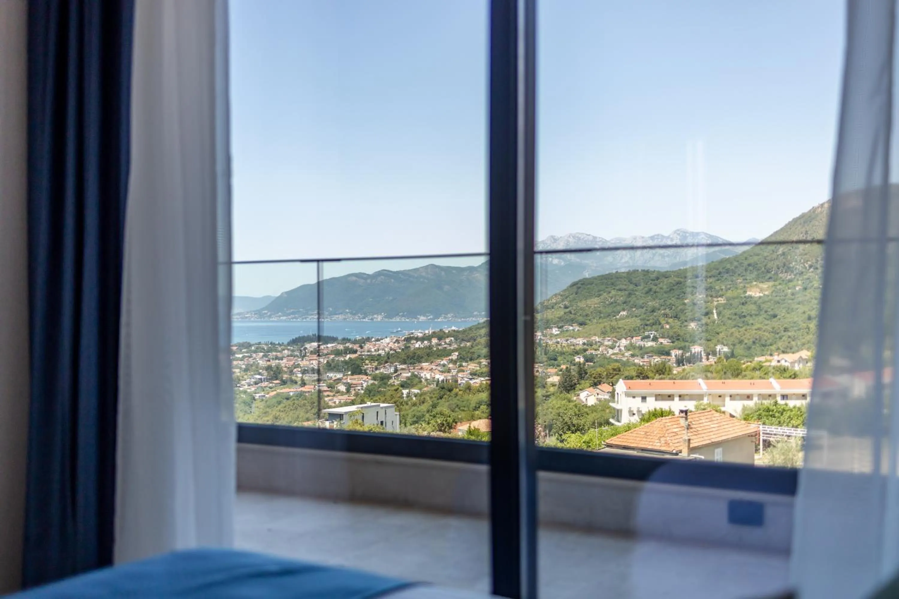 Bed in Royal Blue Resort & Residences