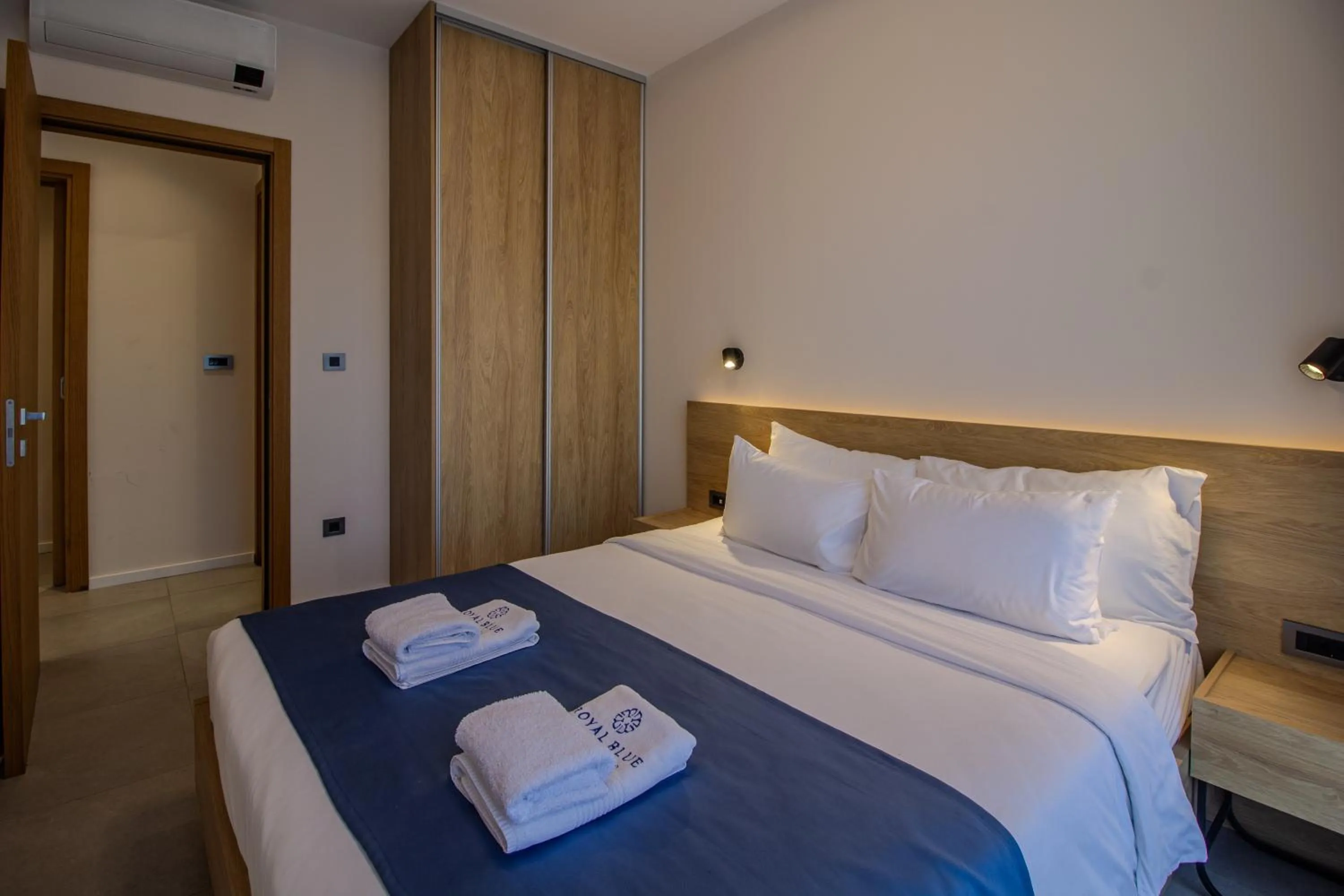 Bed in Royal Blue Resort & Residences