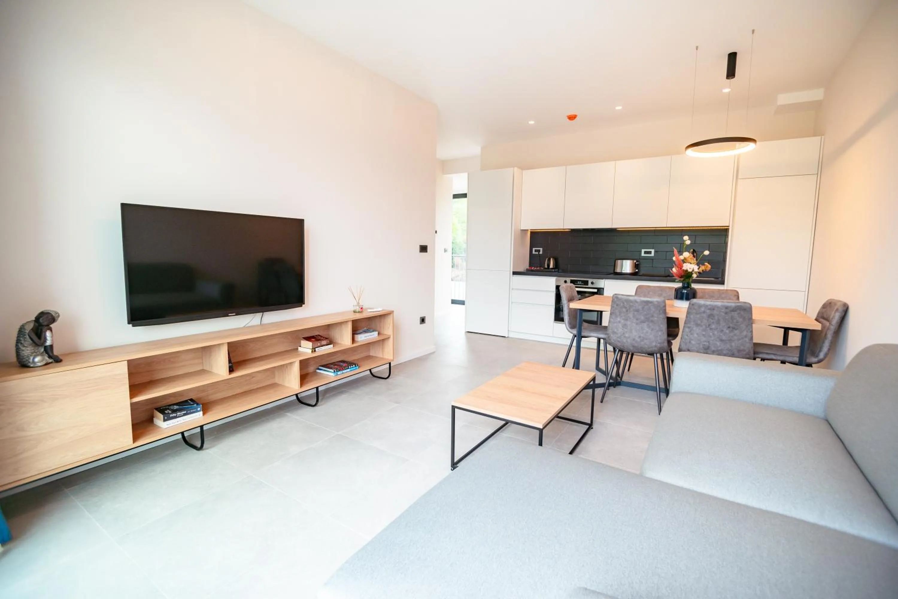 Communal lounge/ TV room in Royal Blue Resort & Residences