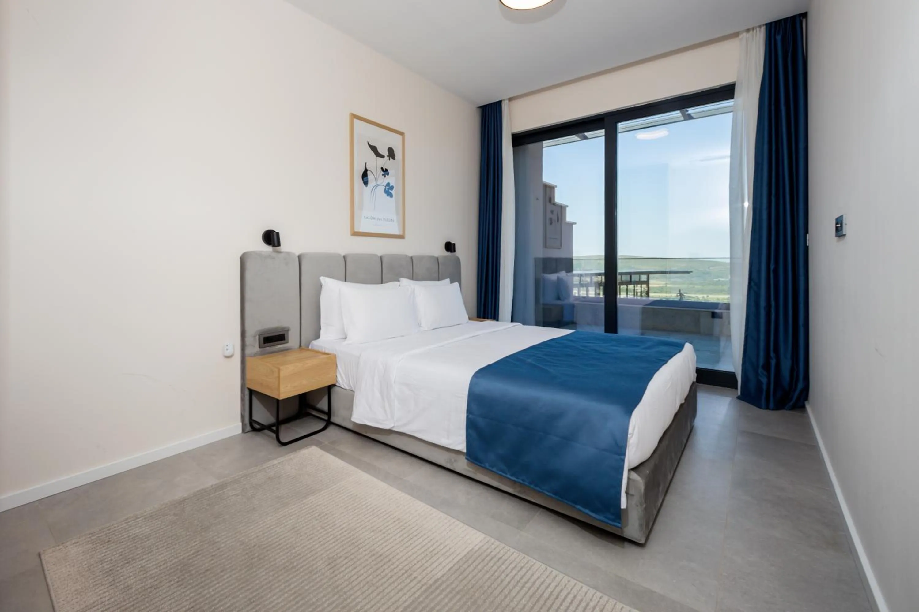 Bed in Royal Blue Resort & Residences