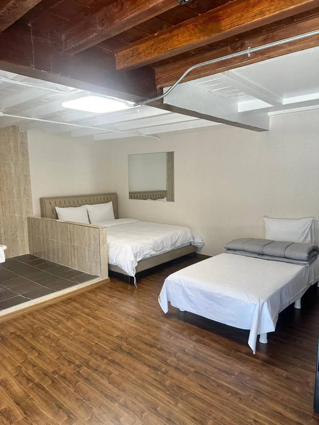 Bed in Woomigwan Hotel