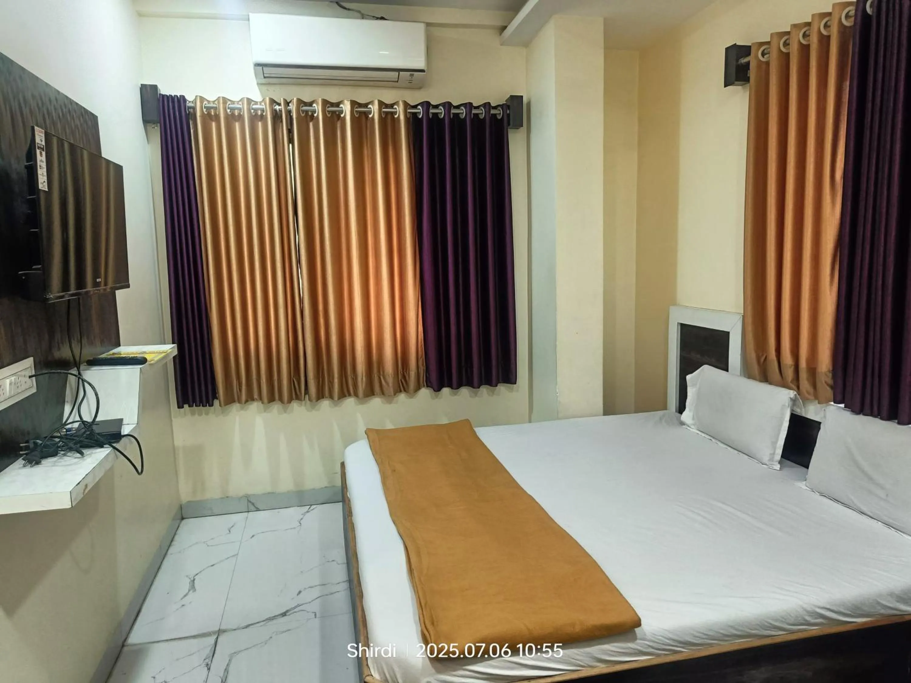 Bed in Hotel Sai viraj palace