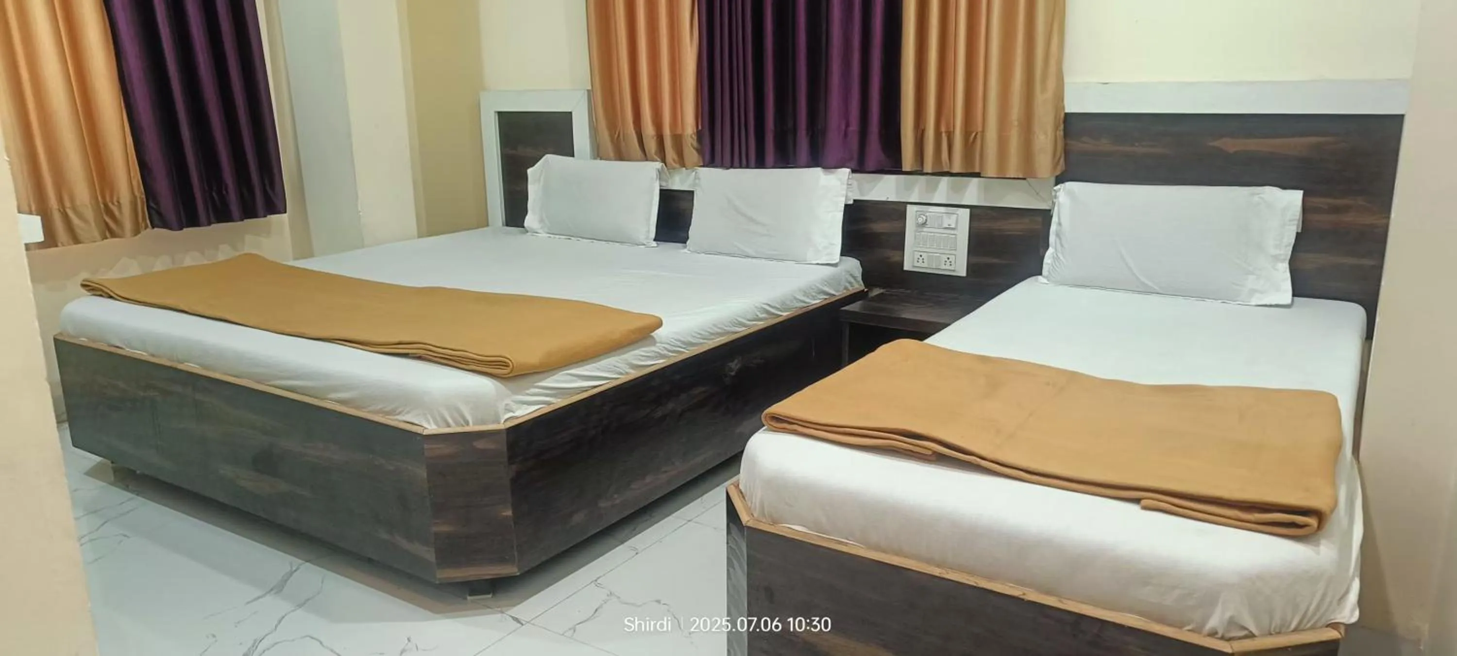 Bed in Hotel Sai viraj palace