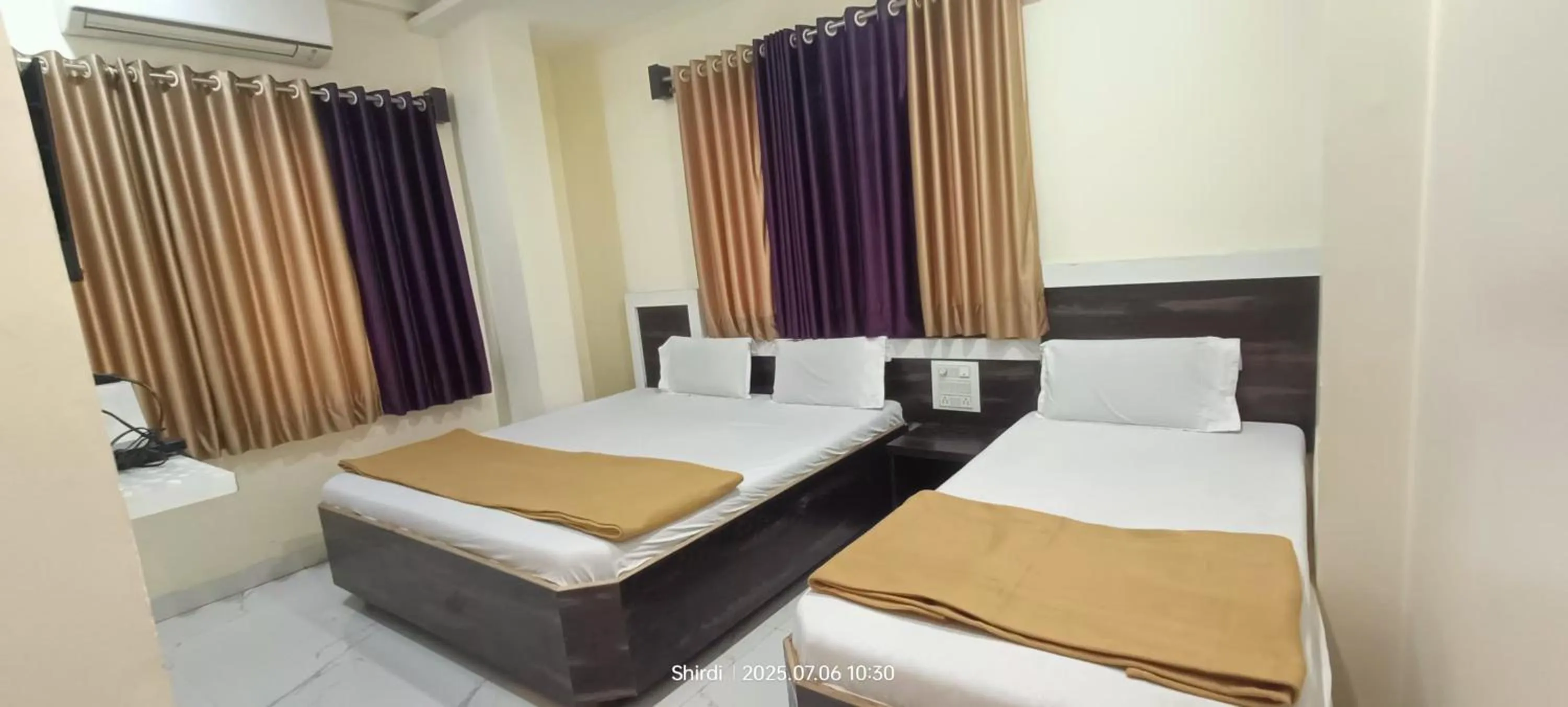 Bed in Hotel Sai viraj palace