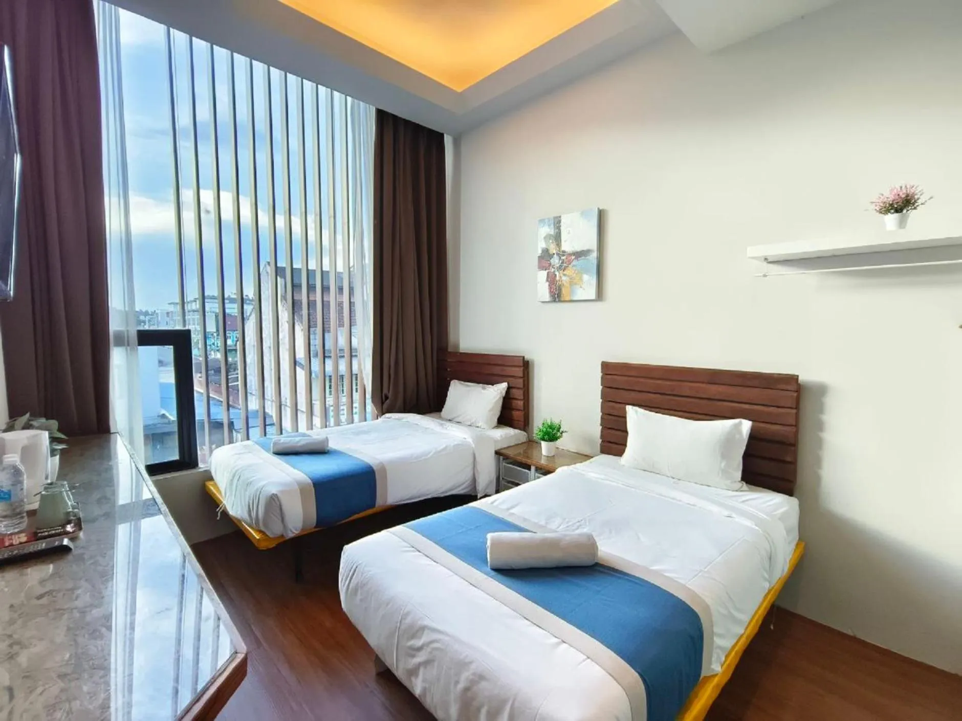 Bed in The Riverbank Hotel By MRVJ Business