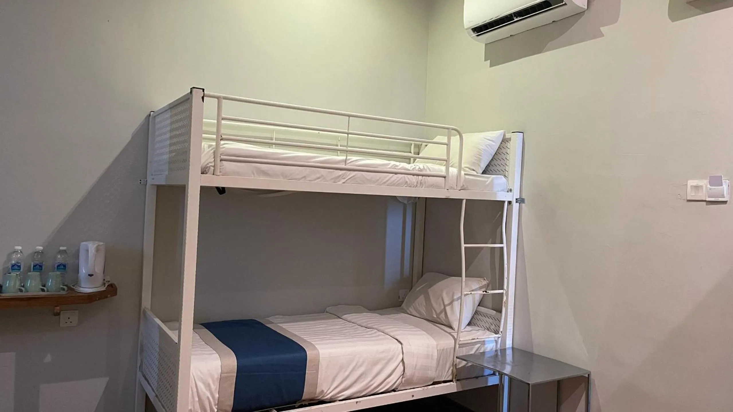 Bed in The Riverbank Hotel By MRVJ Business