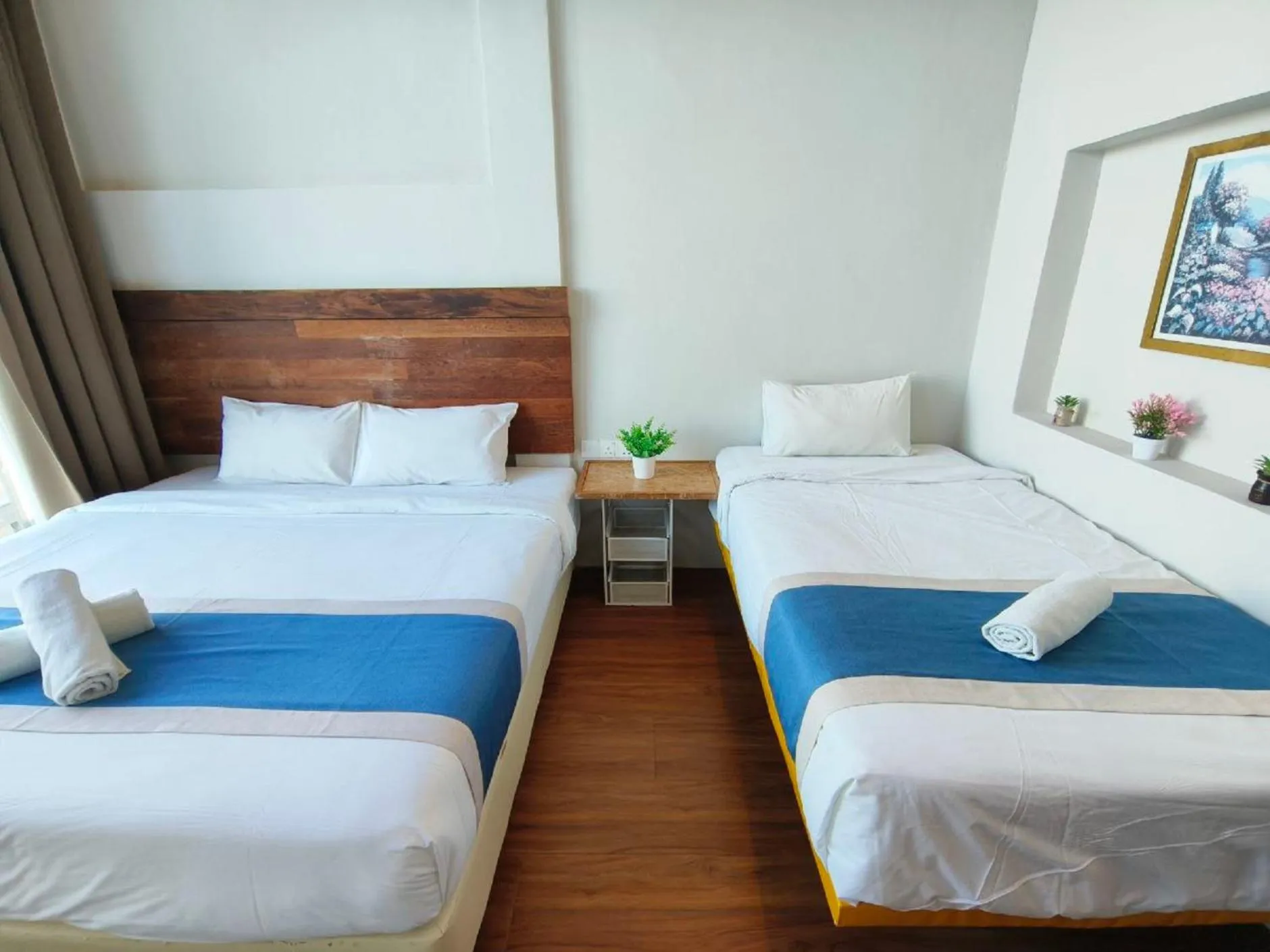 Bed in The Riverbank Hotel By MRVJ Business