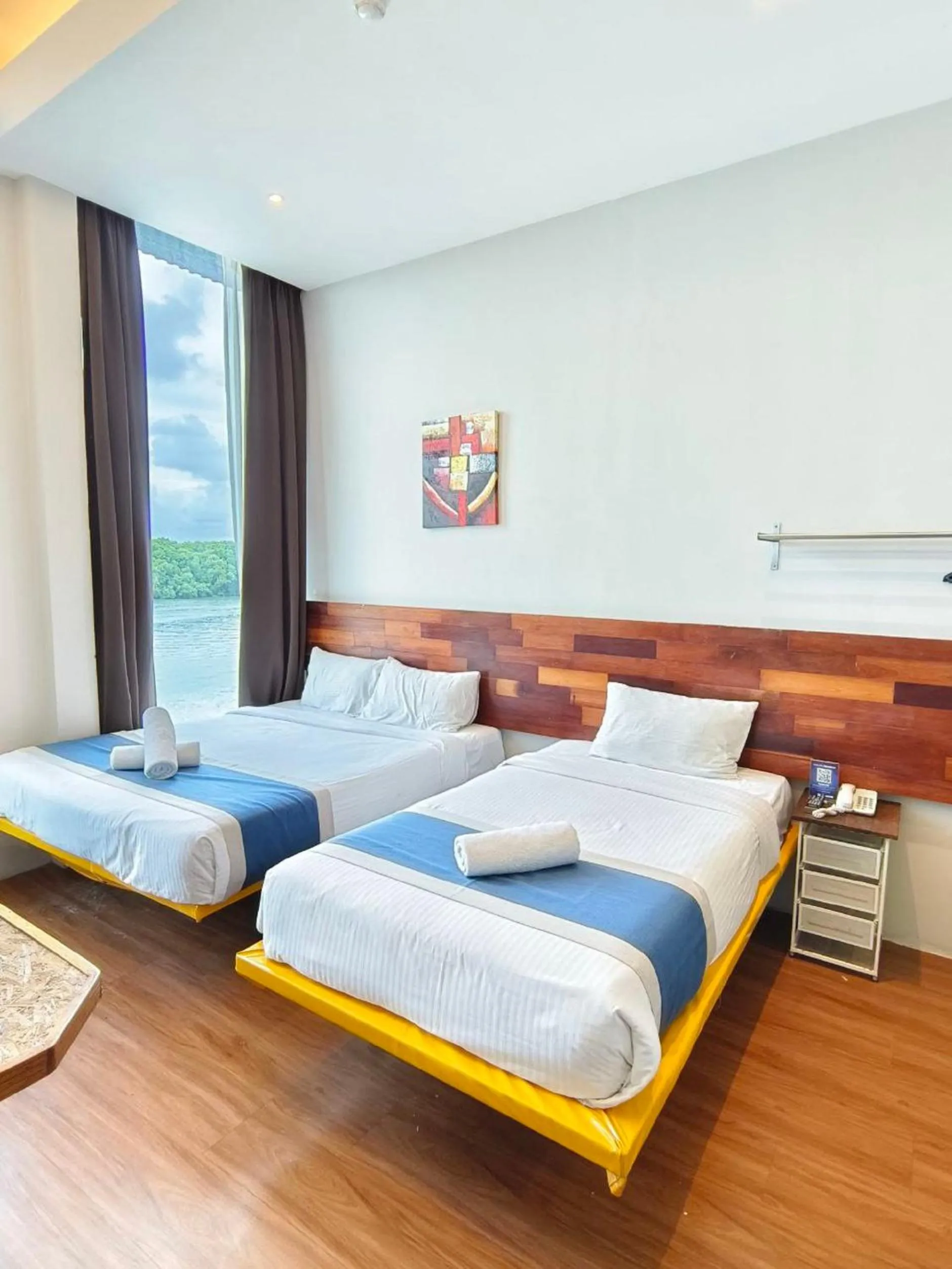 Photo of the whole room, Bed in The Riverbank Hotel By MRVJ Business