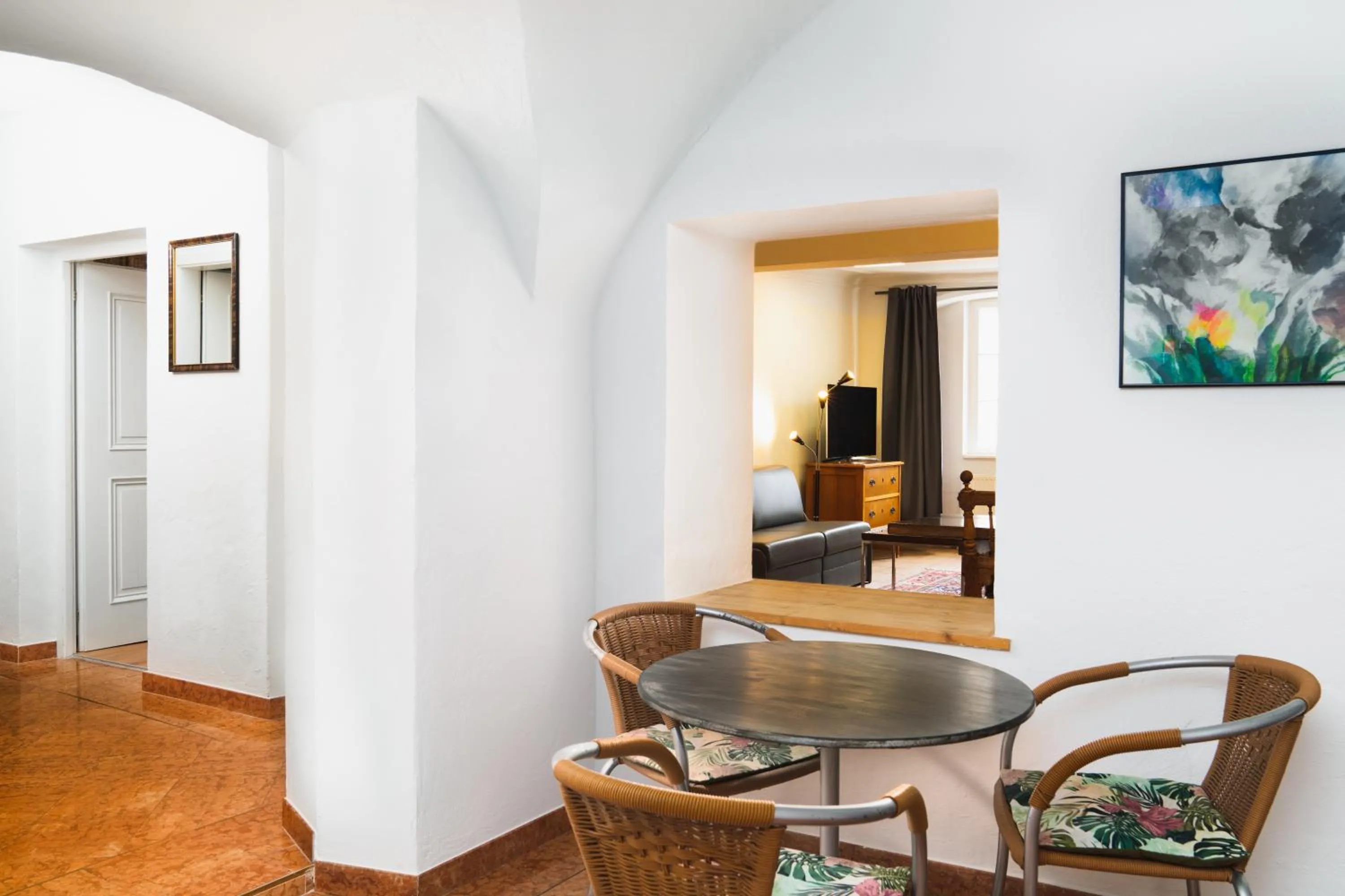 Dining area in Apartments Golden Roof by Penz
