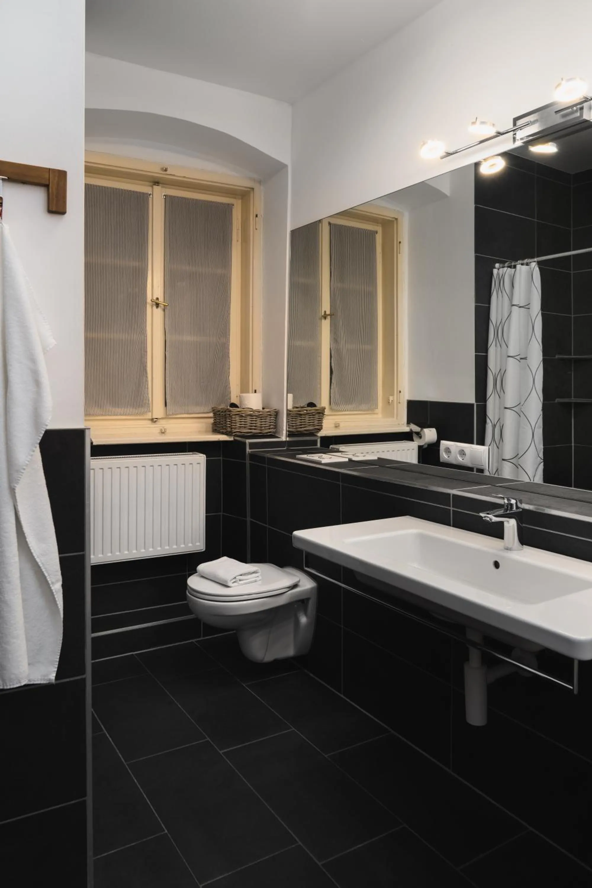 Toilet in Apartments Golden Roof by Penz