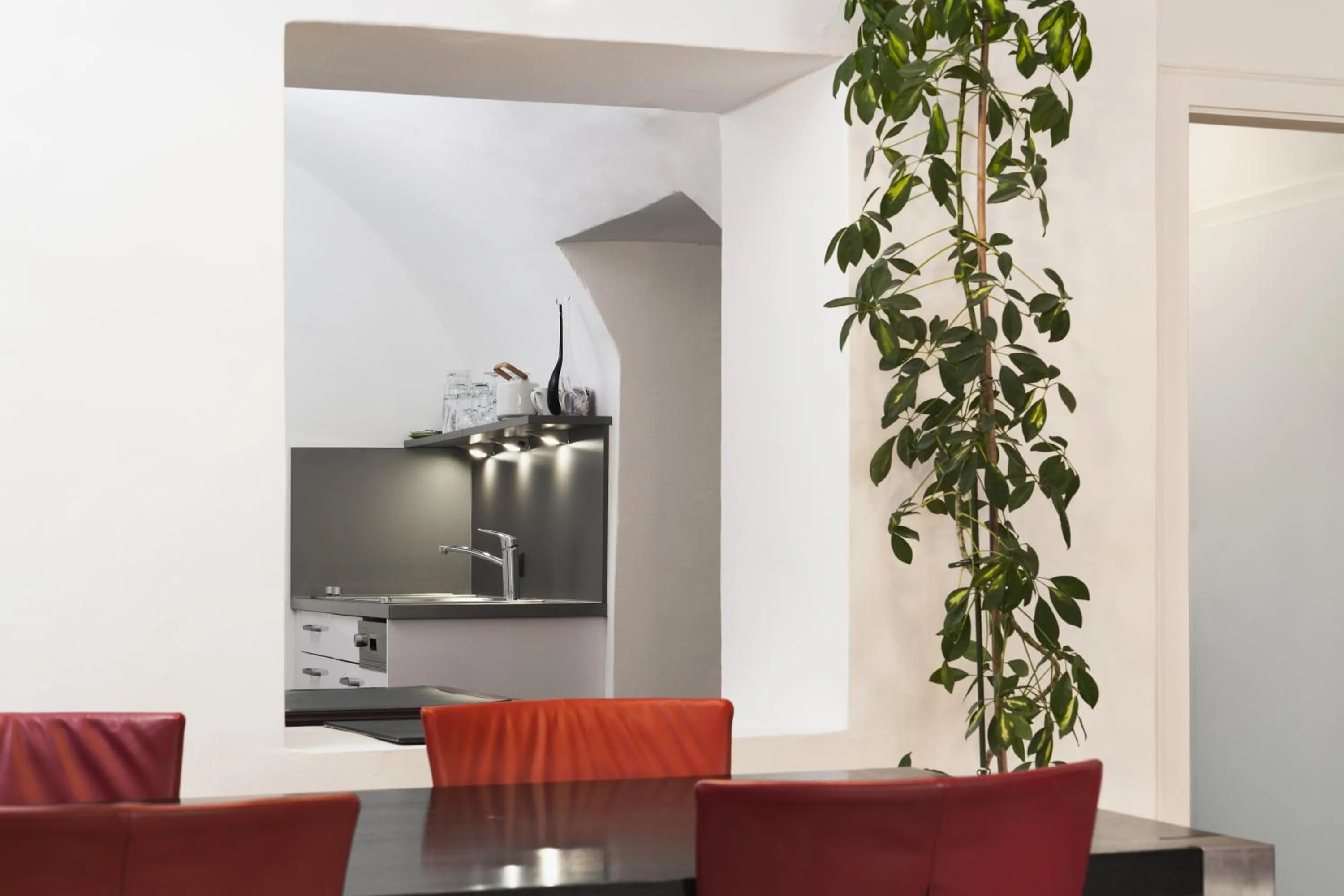 Dining area in Apartments Golden Roof by Penz