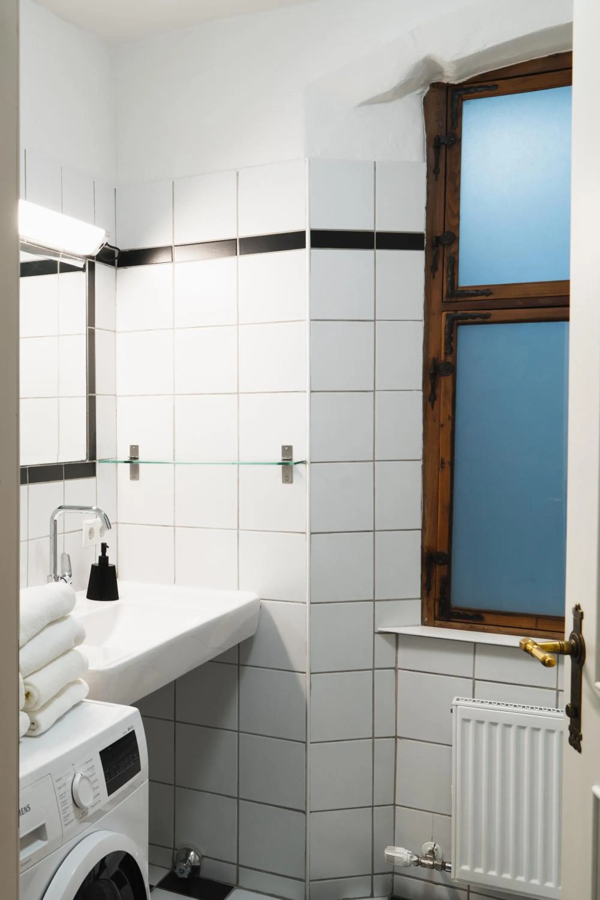 Bathroom in Apartments Golden Roof by Penz