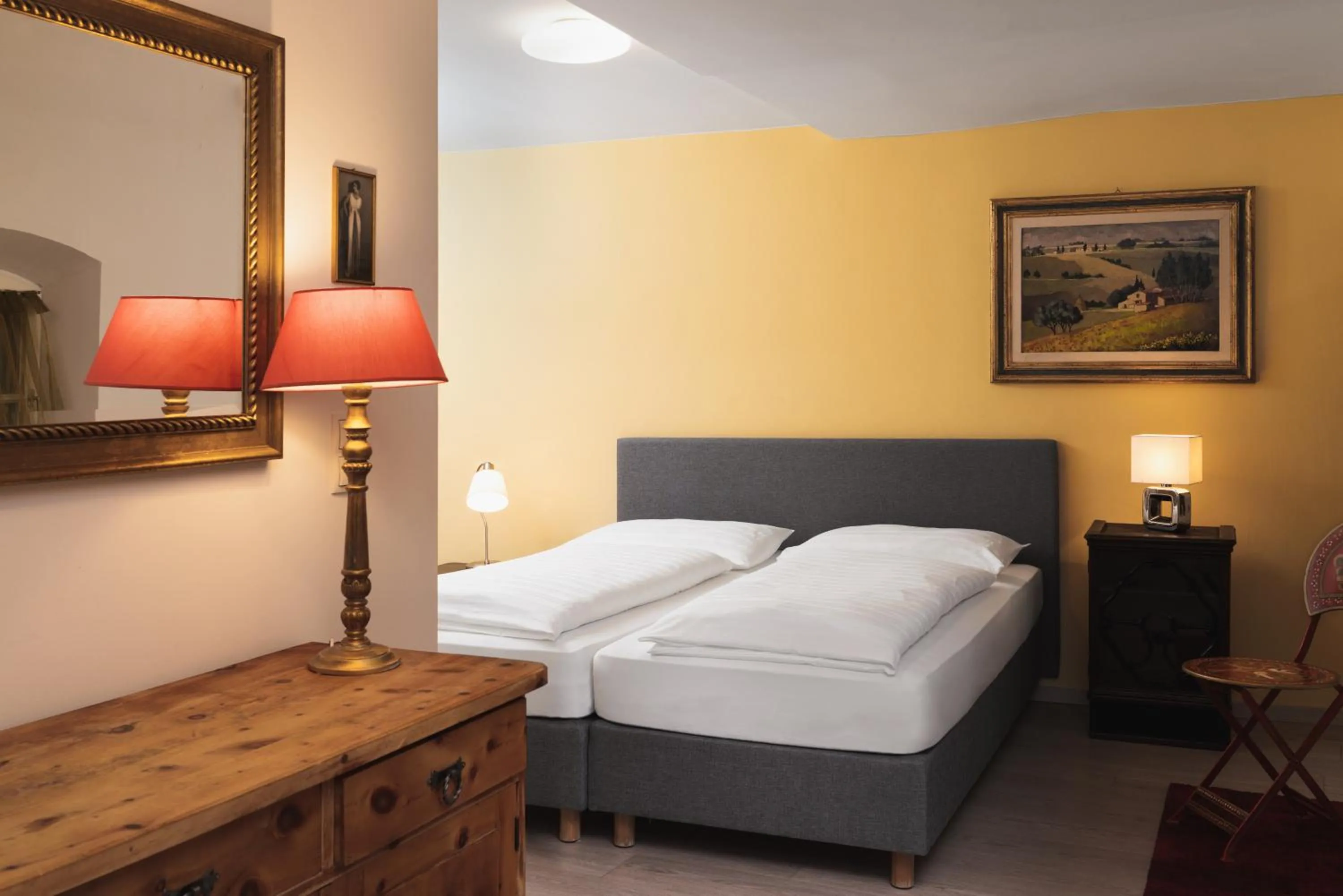 Bed in Apartments Golden Roof by Penz