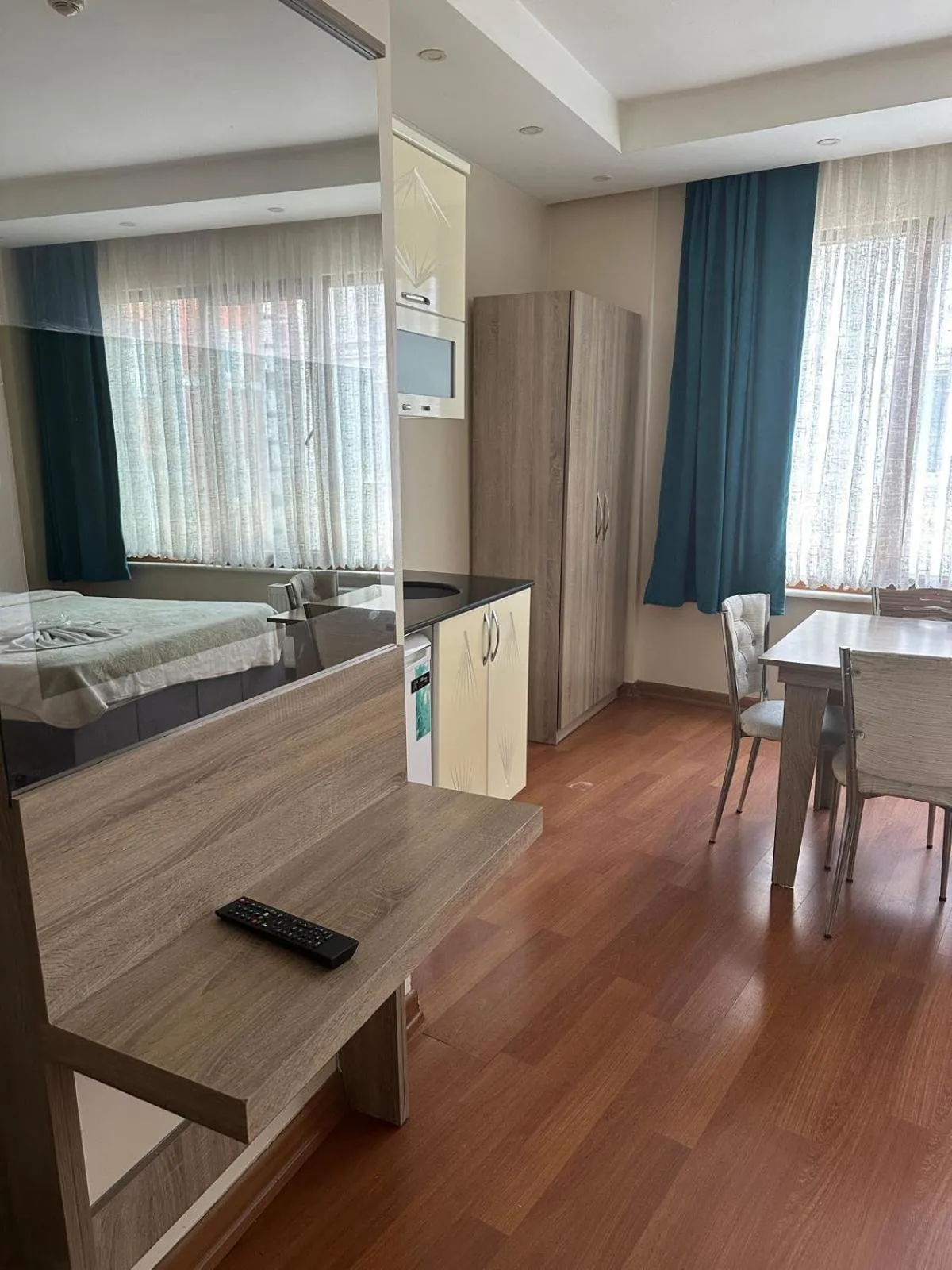 TV and multimedia, Bed in Birinci Apart Hotel