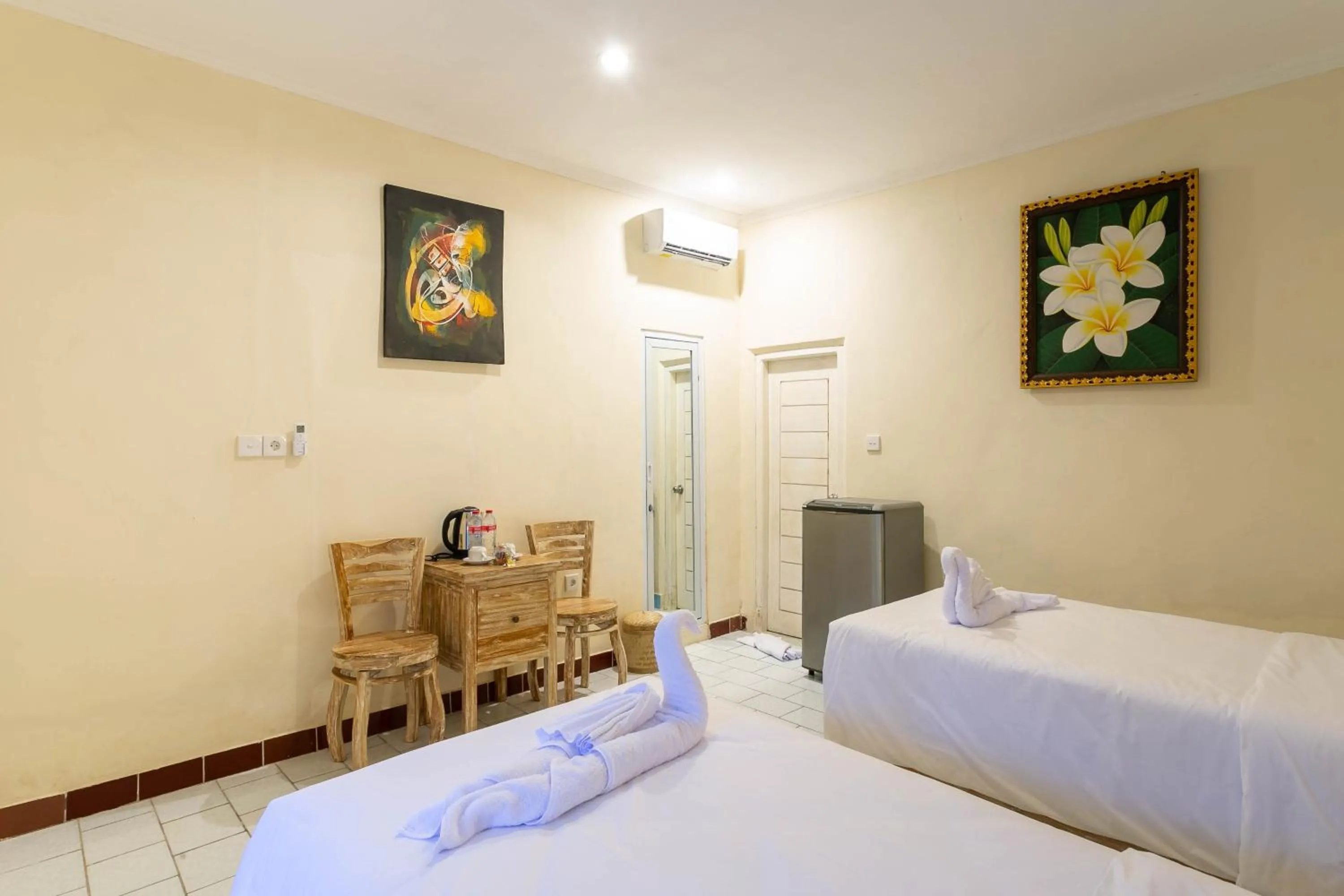 Bed in Utama Villas Beach Front Candidasa