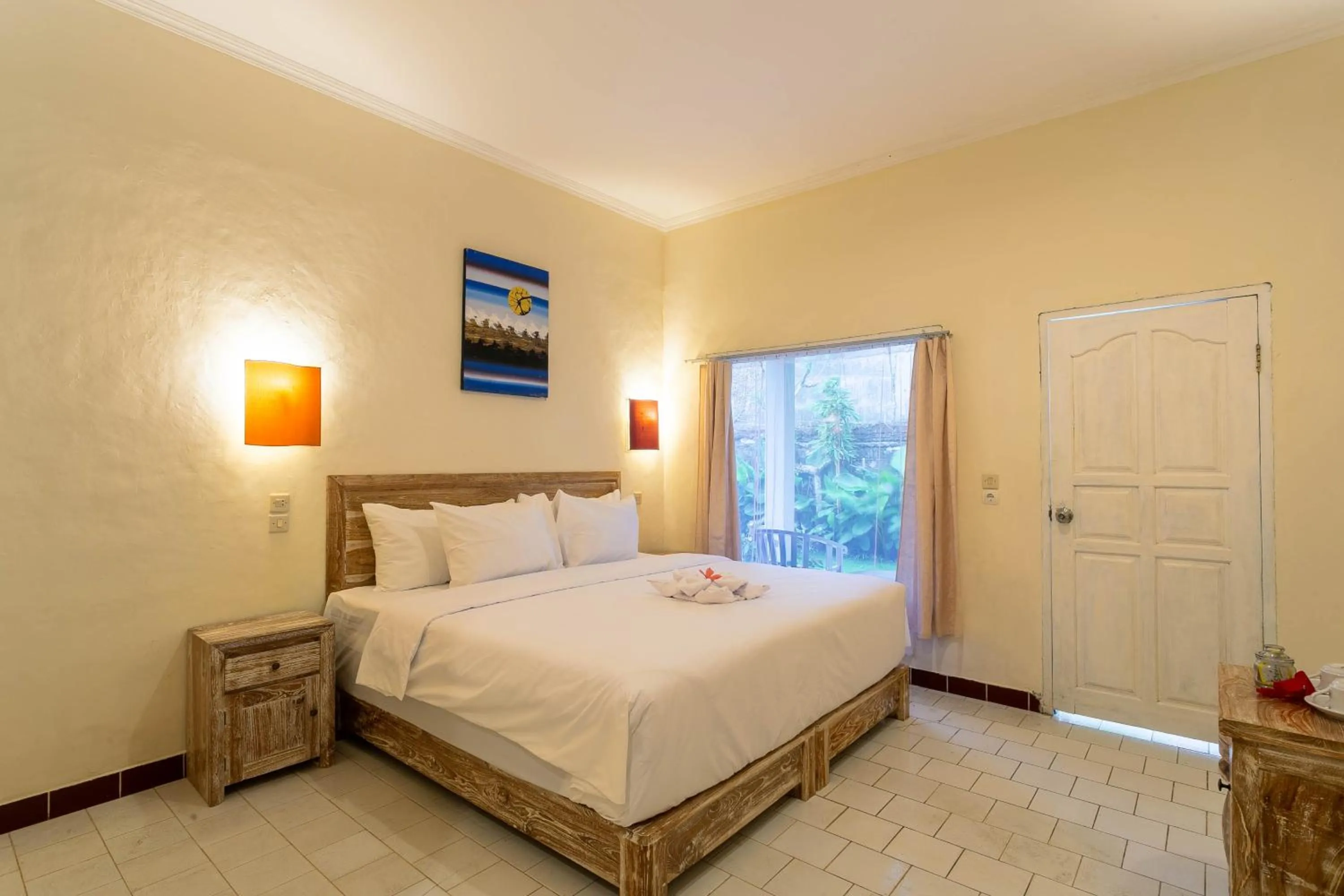 Bed in Utama Villas Beach Front Candidasa