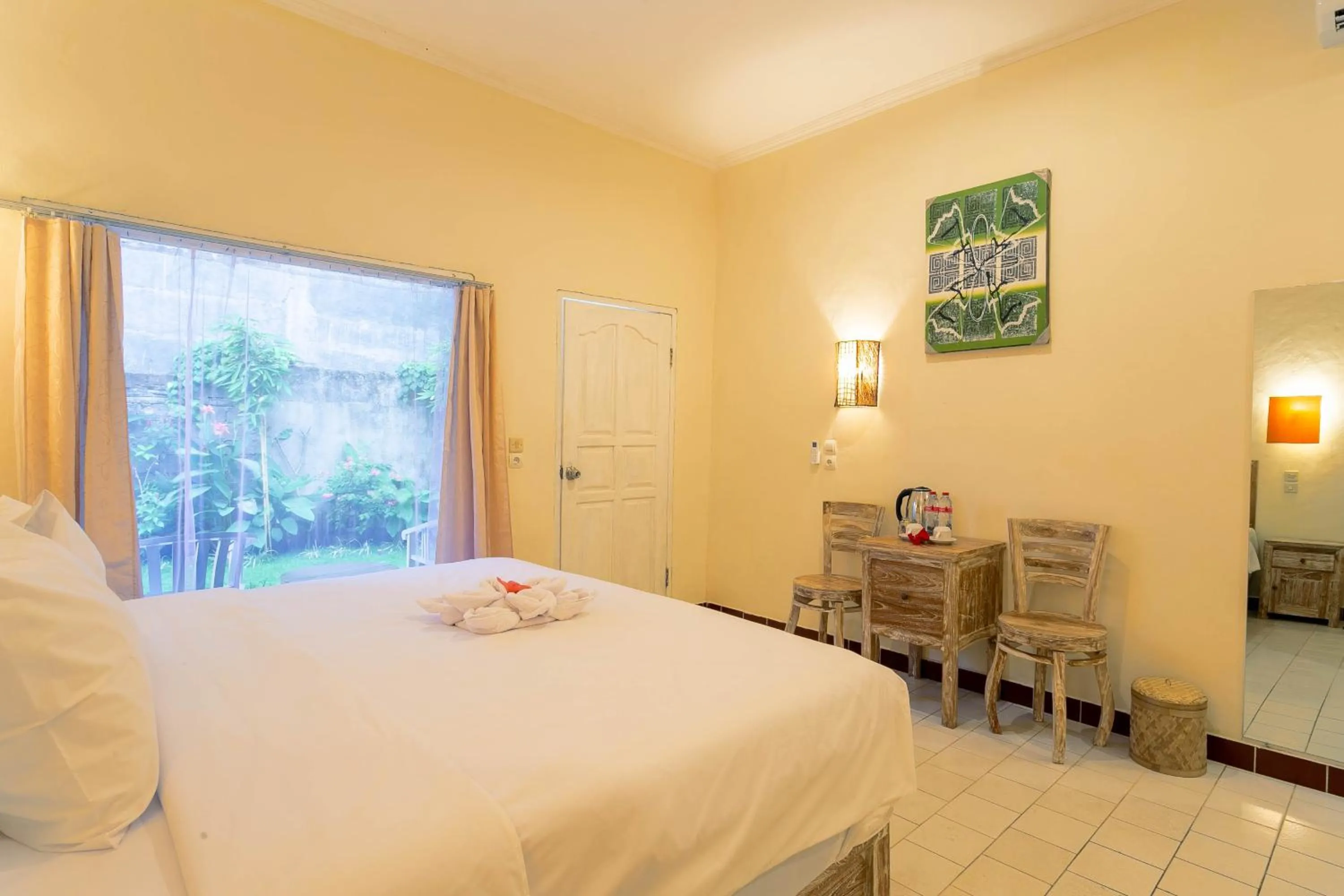 Bed in Utama Villas Beach Front Candidasa