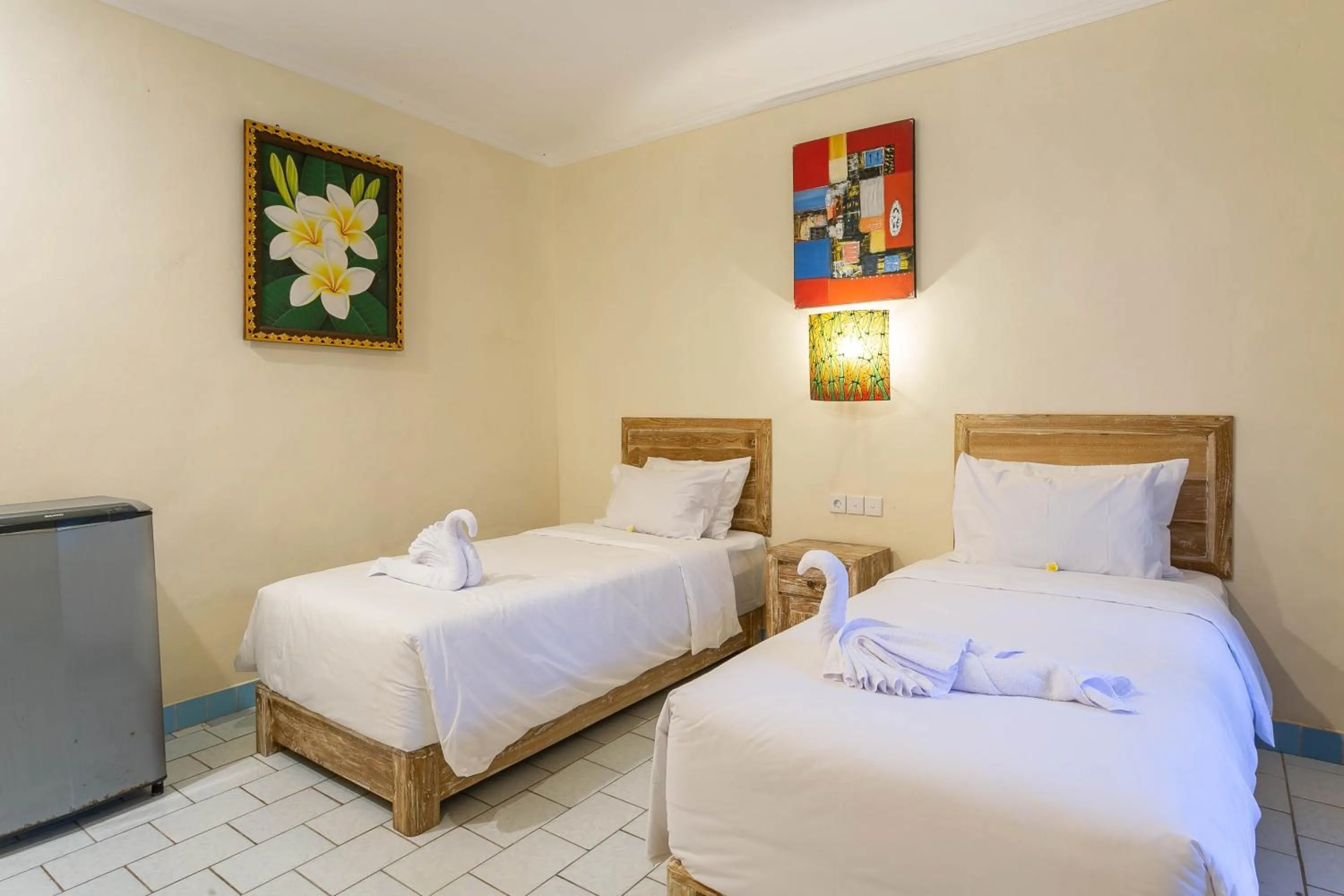 Bed in Utama Villas Beach Front Candidasa