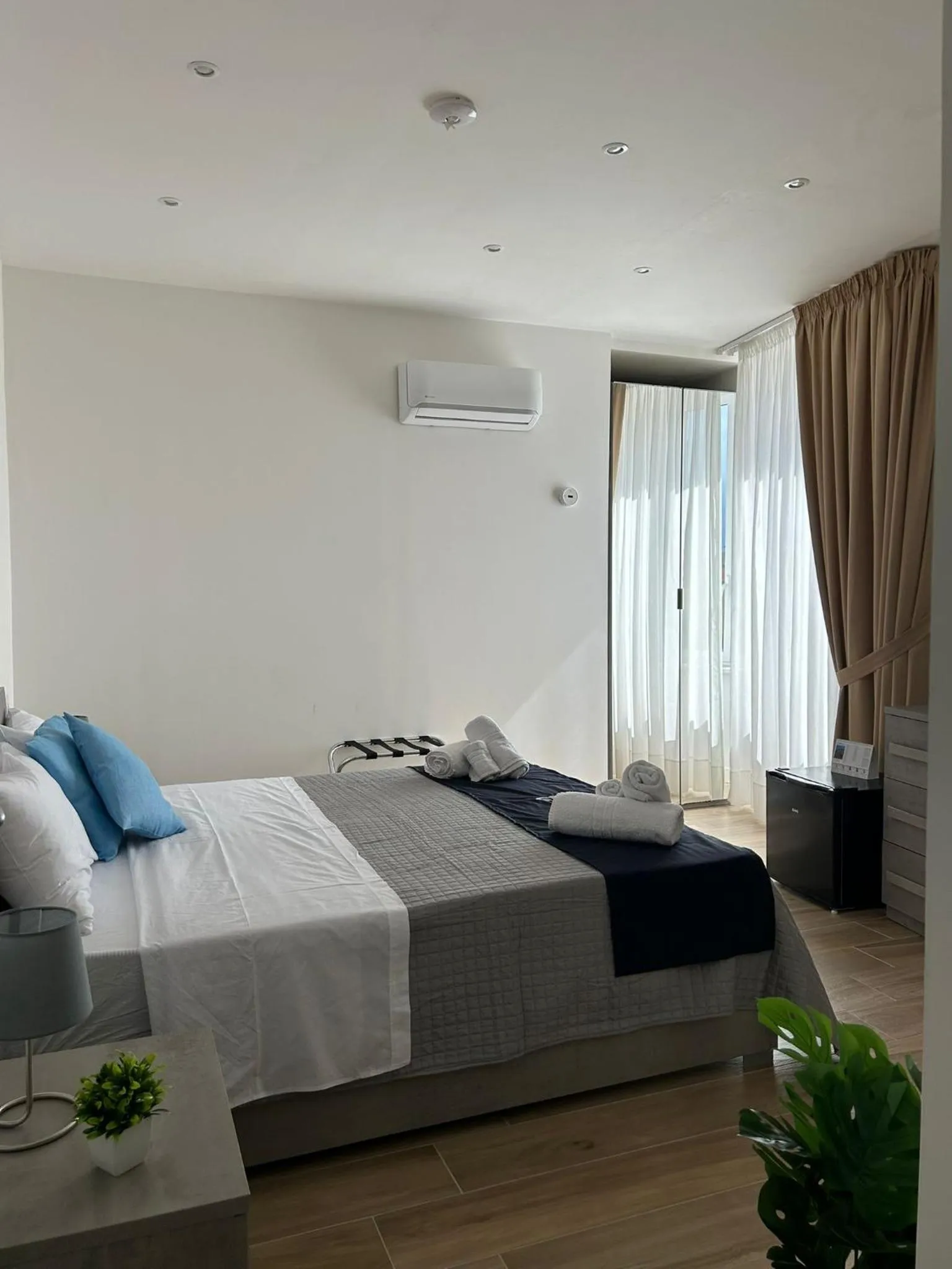 Bed in GIULY SUITES & ROOMS