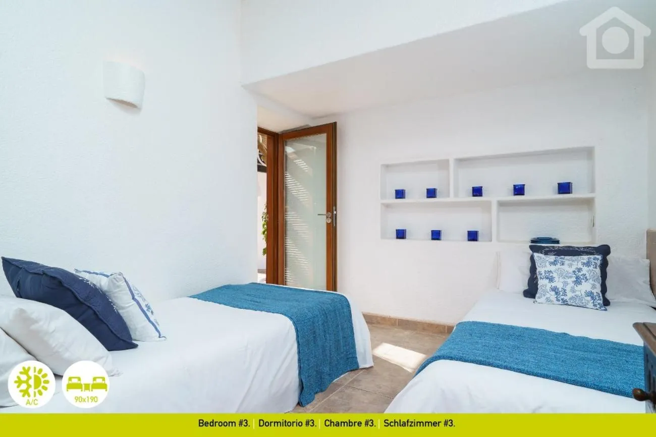 Bed in SolHabitat Villa La Andana