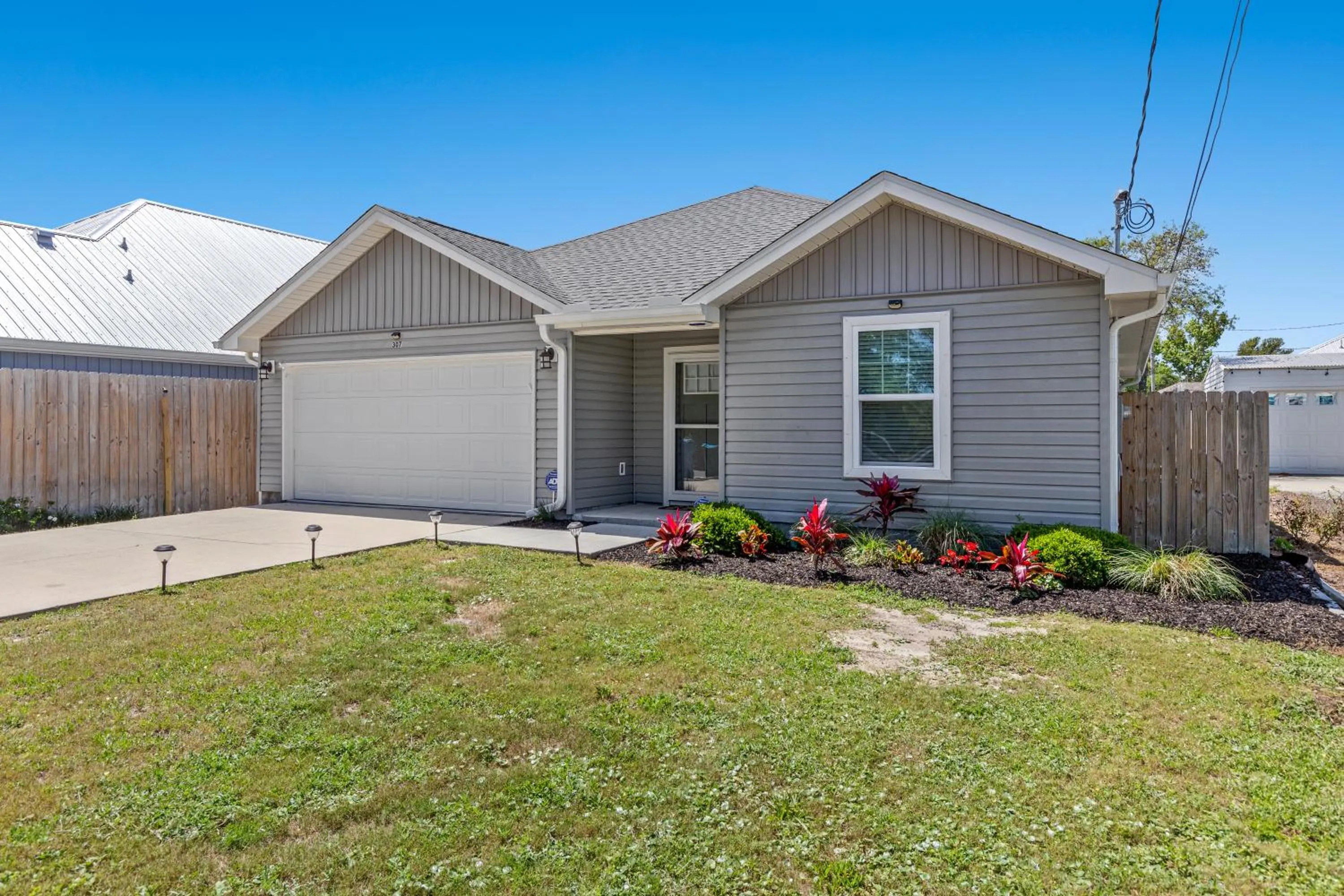 Property building in 3BD, 2BA Home! Family Friendly! Close to Beach! HOT TUB!