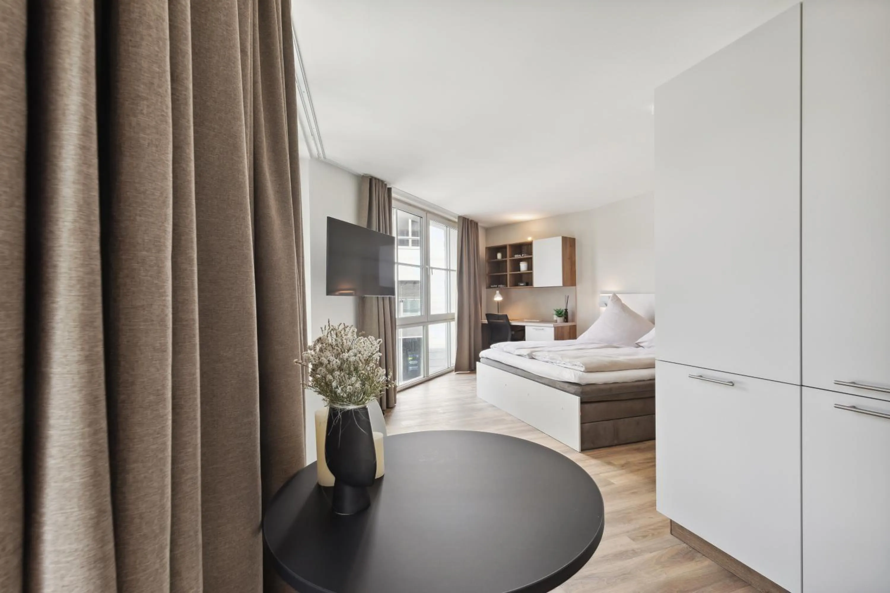 Photo of the whole room, Bed in Home and CoLiving Bonn I Aparthotel