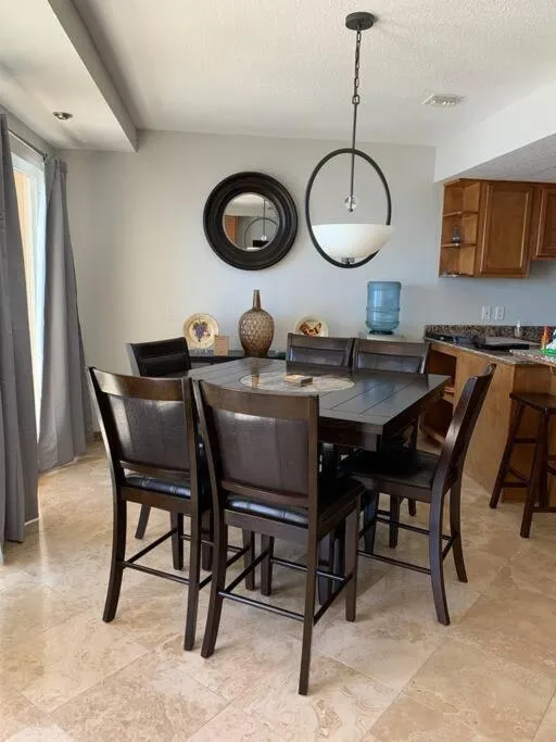 Dining area in The Dolphins Ocean Front-Beach 2 BR 2Bth