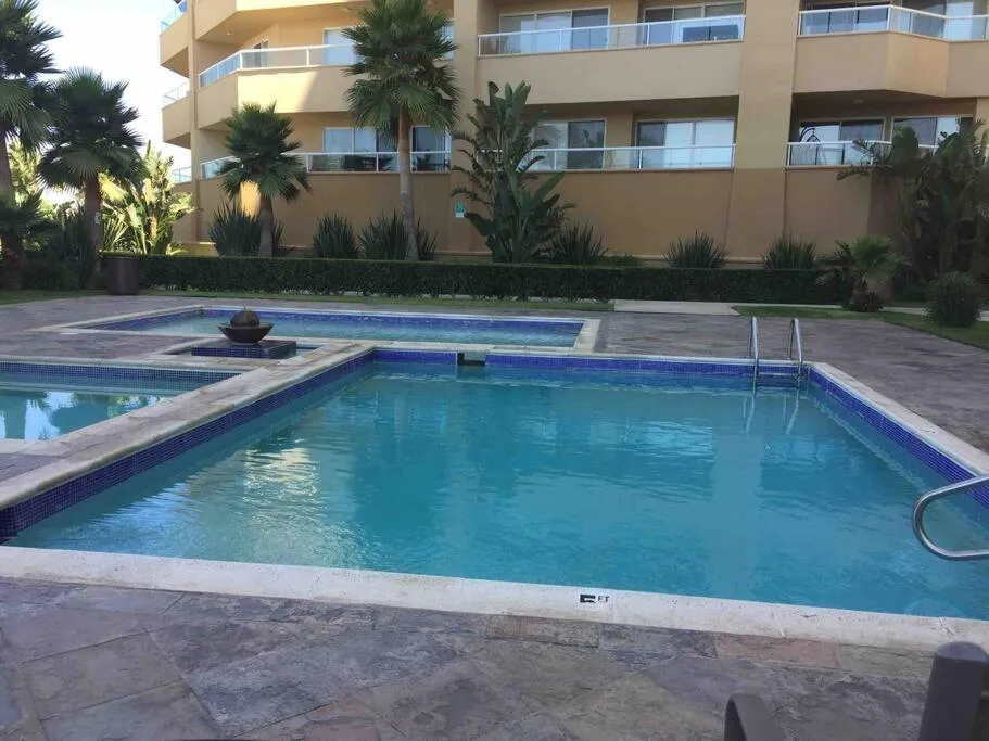 Swimming pool in The Dolphins Ocean Front-Beach 2 BR 2Bth