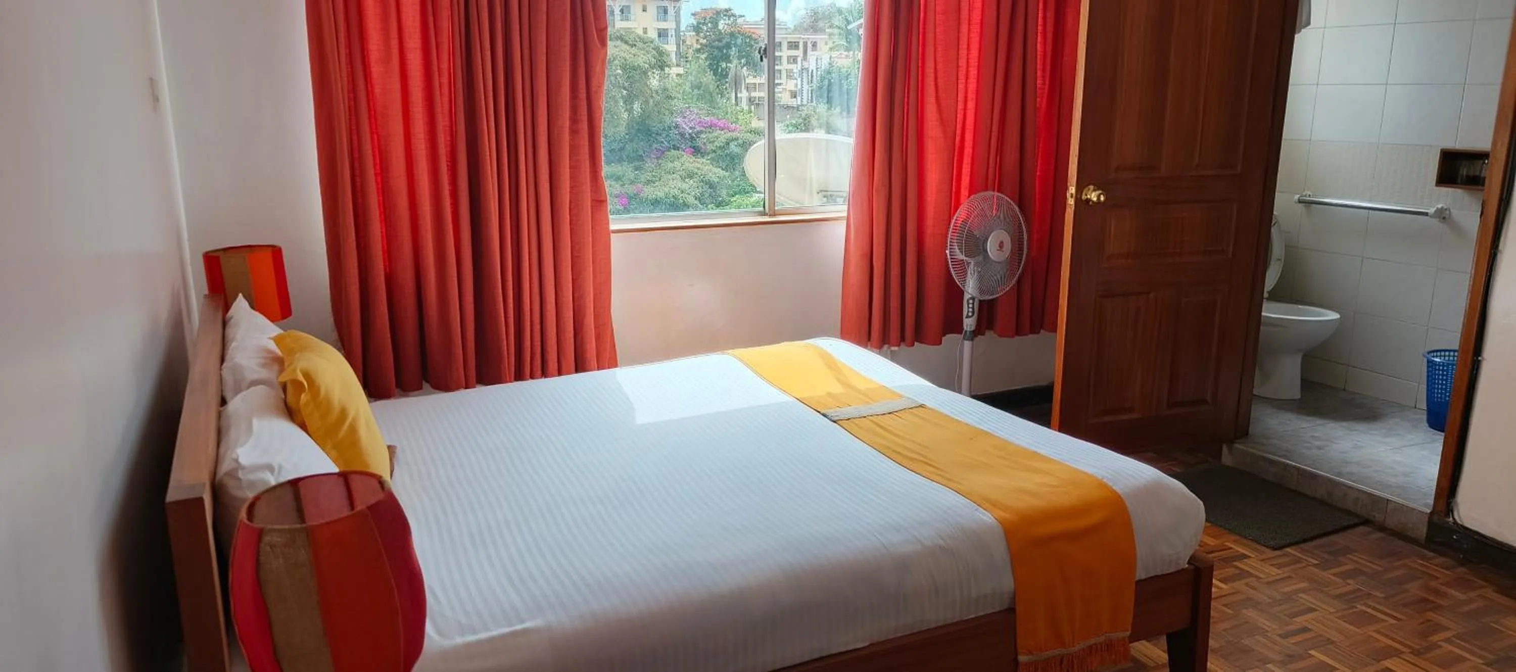 Bed in Kenya Comfort Suites