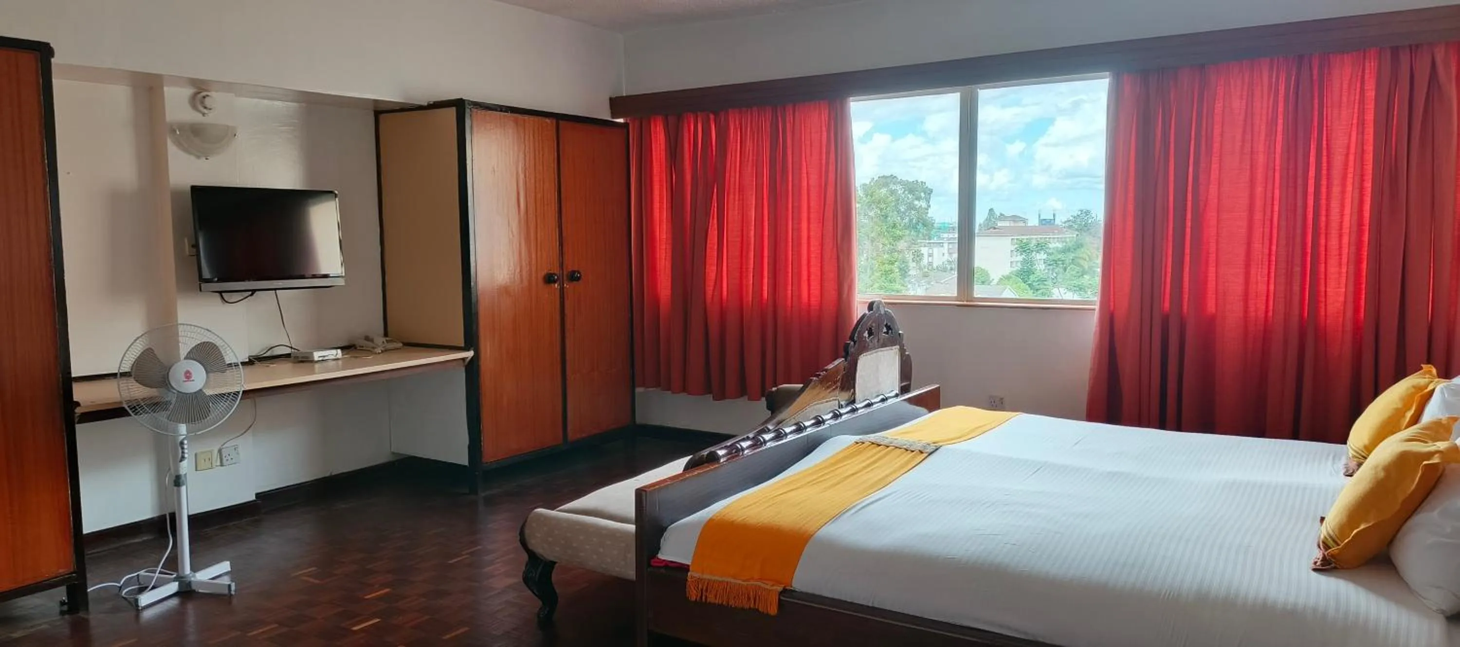 Bed in Kenya Comfort Suites