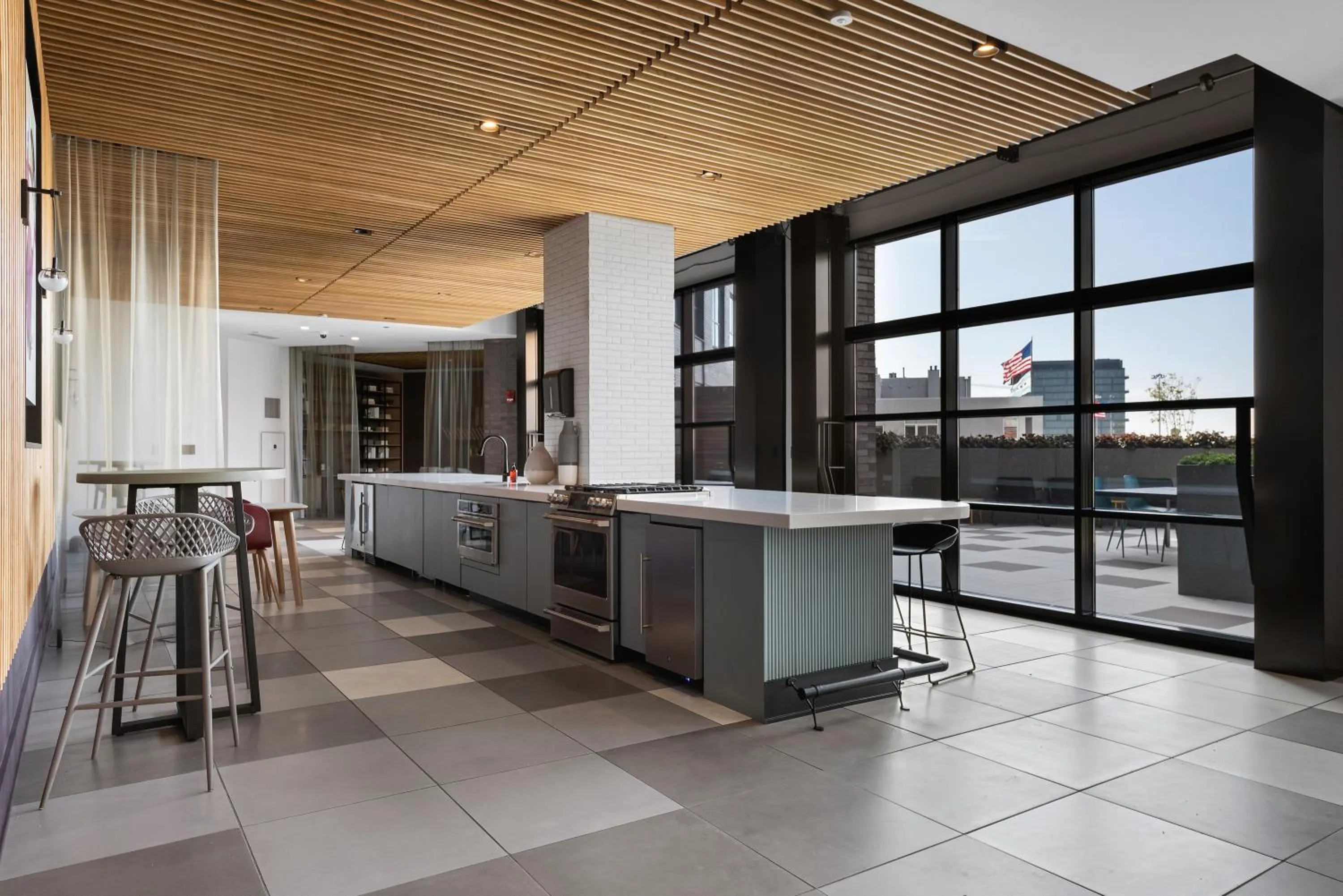 Communal kitchen in Avenir West Loop Penthouses with Iconic City Views